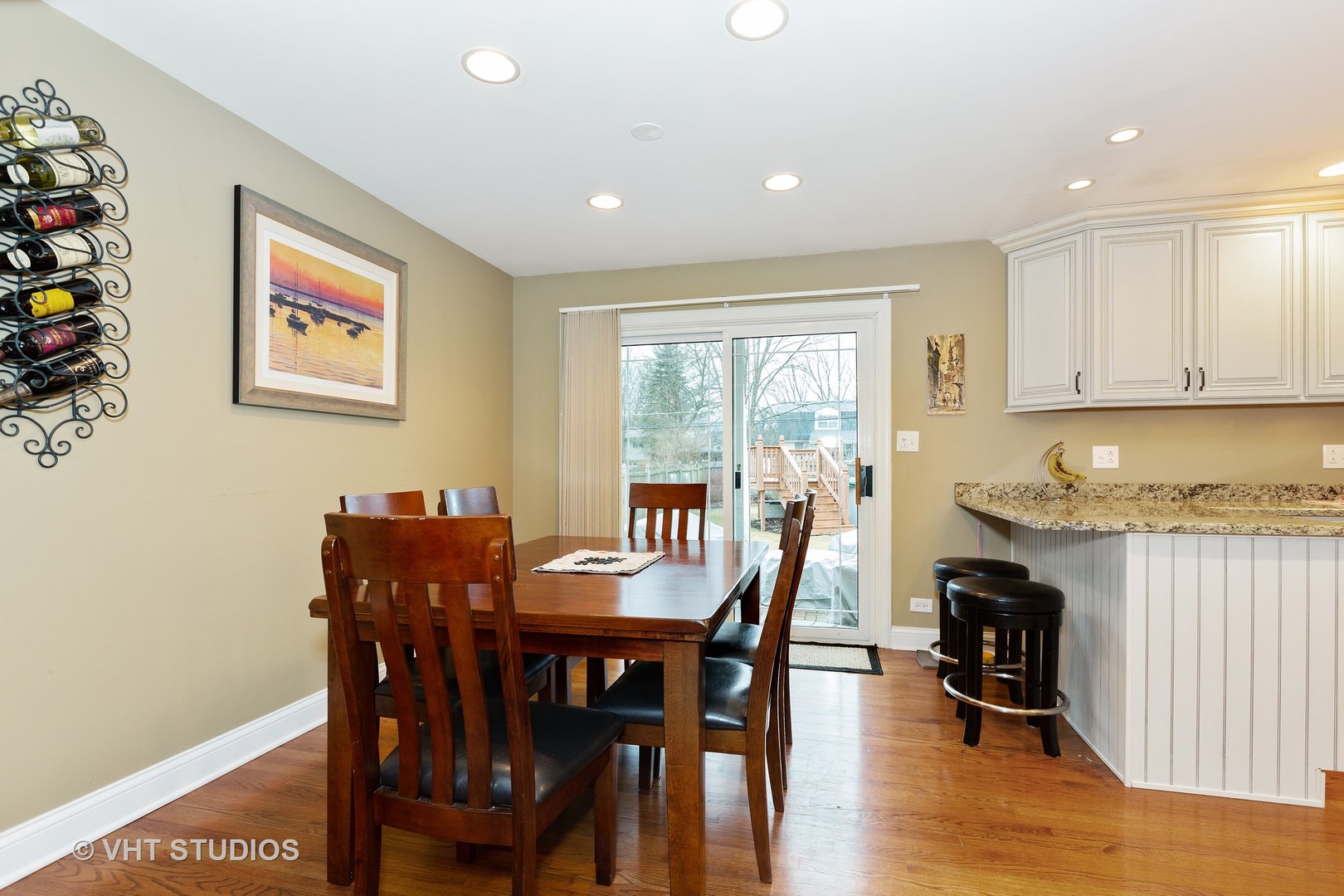 314 Highland Road Willowbrook, IL 60527 - Photo 4 of 15 a view of a dining room with furniture window and wooden floor