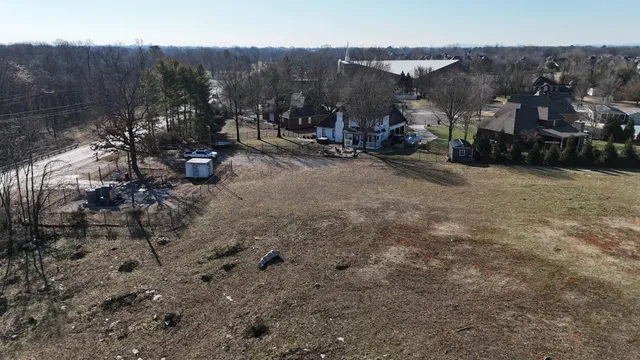 a view of dirt yard with mountain view