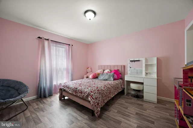 a bedroom with a bed and a closet