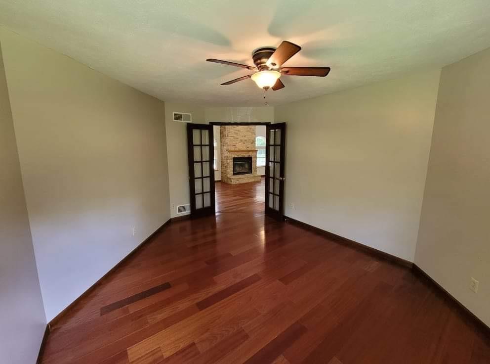21 Clark Avenue Spring Church, PA 15686 - Photo 22 of 25 wooden floor in an empty room with a window