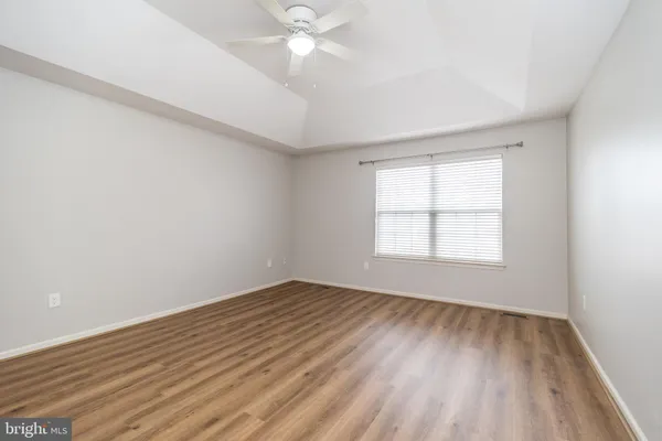 a bathroom with a double vanity sink mirror and shower