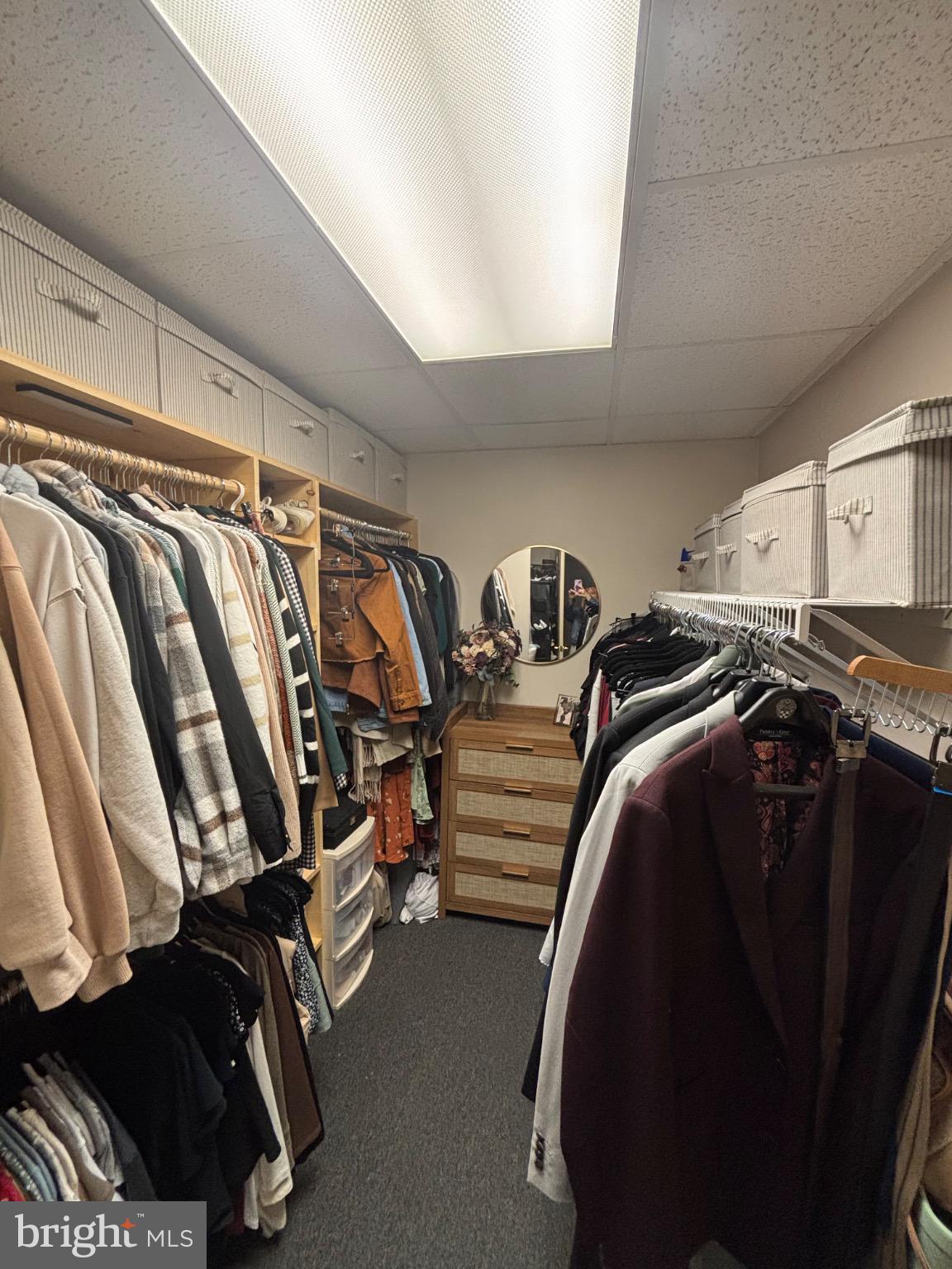 145 Main Street, Unit C Pennsburg, PA 18073 - Photo 5 of 7 a view of walk in closet with clothes and shoes