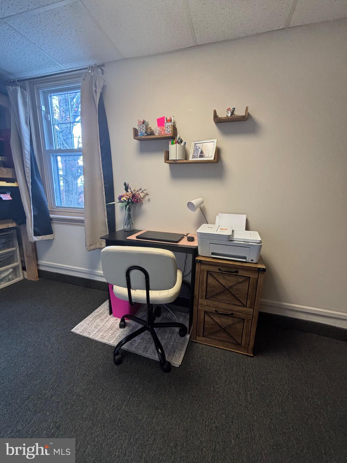 145 Main Street, Unit C Pennsburg, PA 18073 - Photo 6 of 7 a room with furniture and window