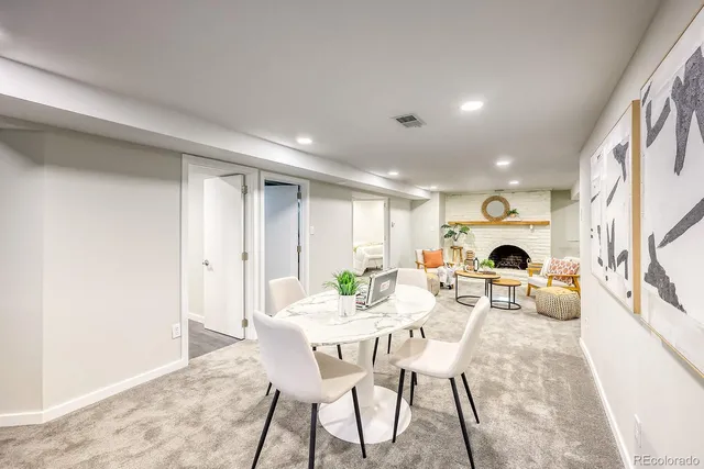 a view of a dining room with furniture window and outside view