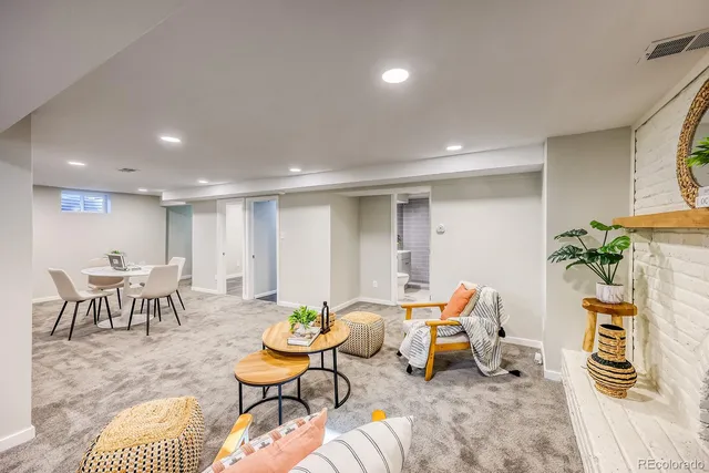 a living room with furniture and a table