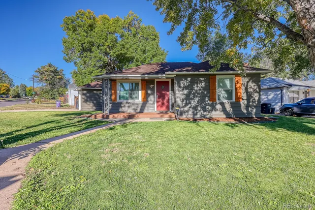 front view of a house with a yard