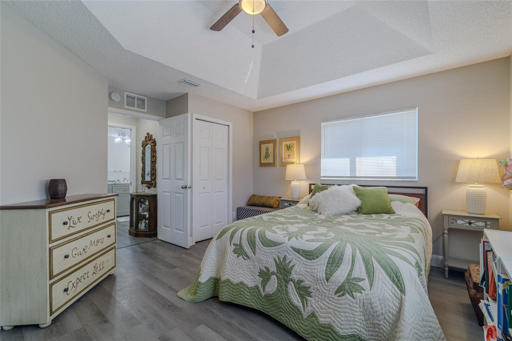 5334 Northwest 19th Place Ocala, FL 34482 - Photo 16 of 42 a bedroom with a bed and a dresser