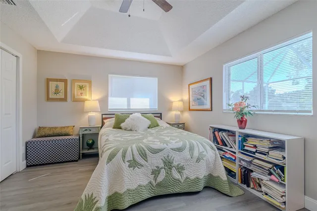 a bedroom with bed and a couch