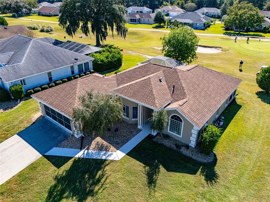 5334 Northwest 19th Place Ocala, FL 34482 - Photo 30 of 42 an aerial view of a house with swimming pool and large trees