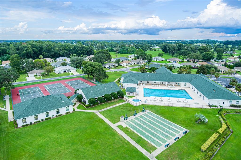 5334 Northwest 19th Place Ocala, FL 34482 - Photo 37 of 42 a view of a swimming pool with a garden