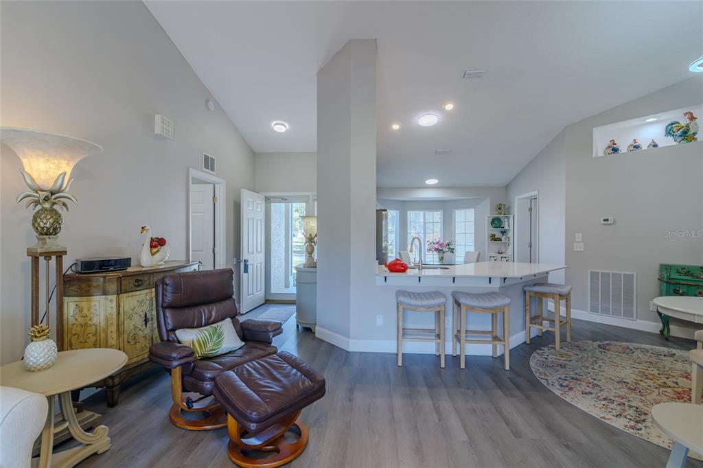 5334 Northwest 19th Place Ocala, FL 34482 - Photo 5 of 42 a living room with furniture and wooden floor