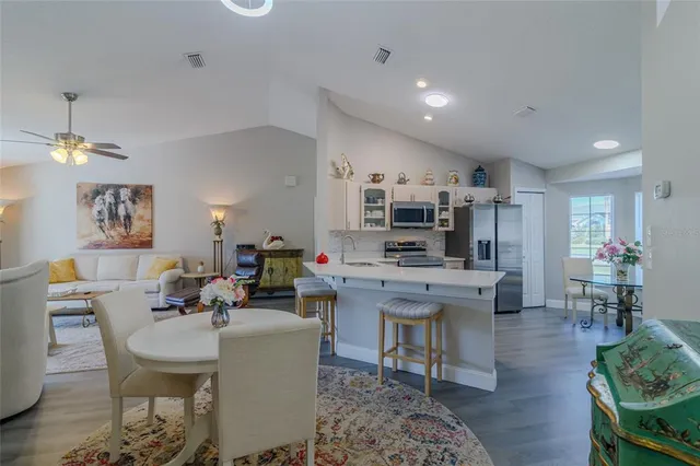 a view of a dining room with furniture
