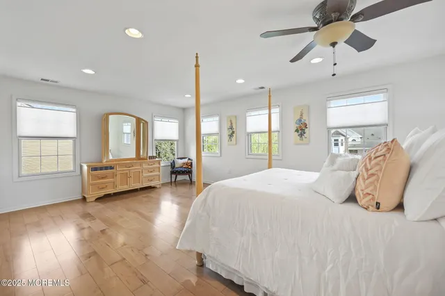 a bath tub sitting next to a window
