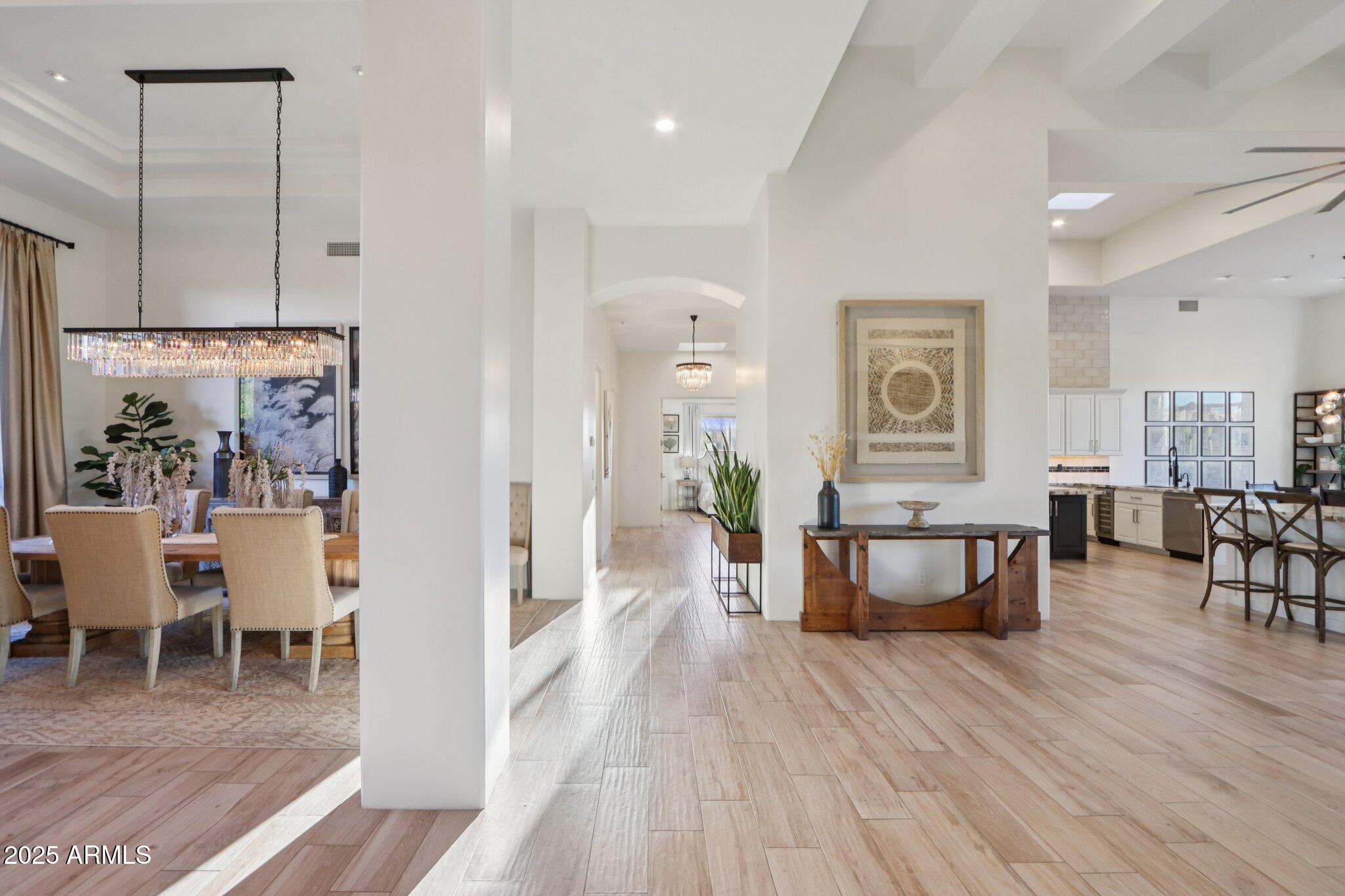 30600 North Pima Road, Unit 49 Scottsdale, AZ 85266 - Photo 53 of 53 a living room with furniture and a wooden floor