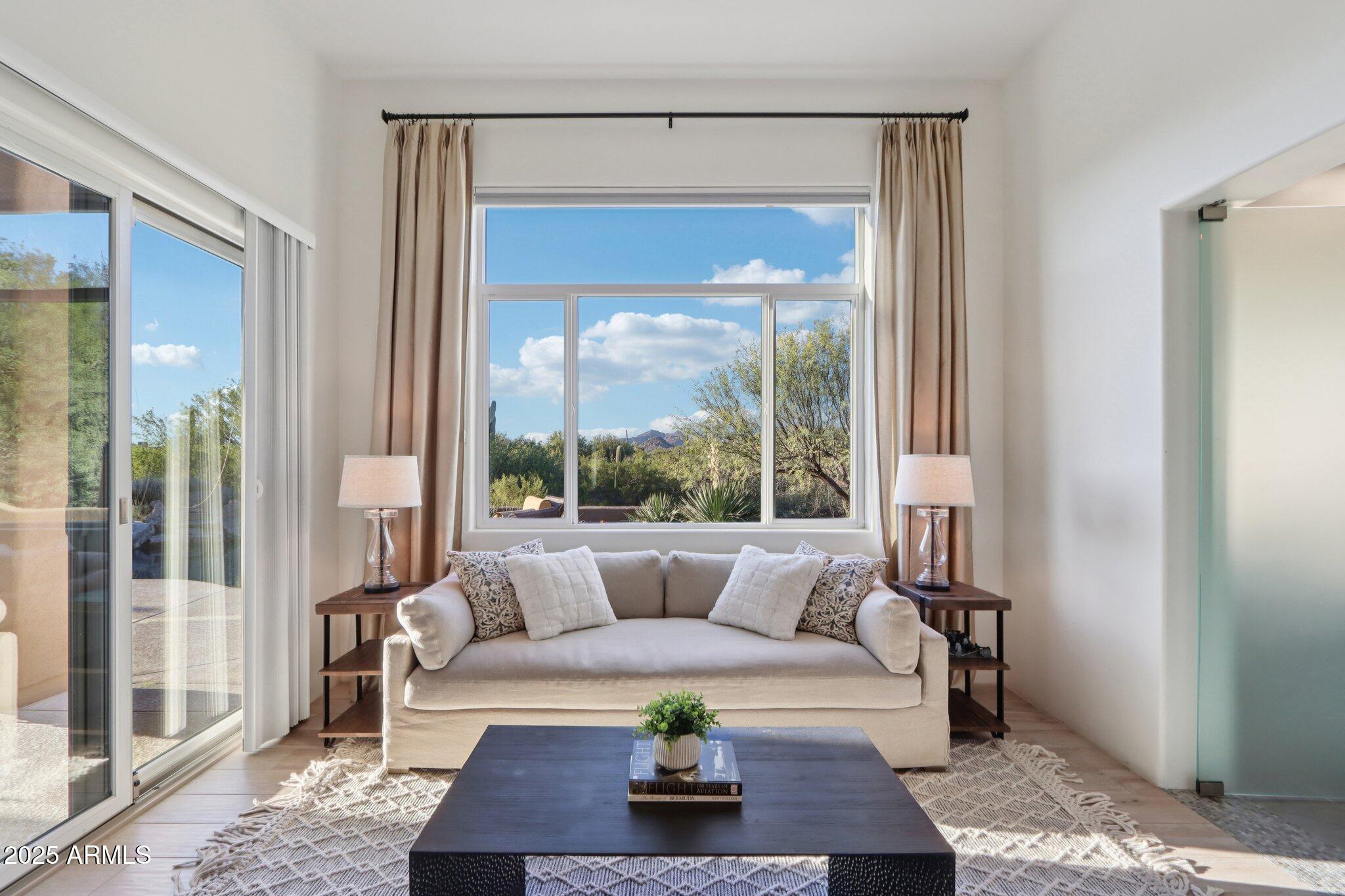 30600 North Pima Road, Unit 49 Scottsdale, AZ 85266 - Photo 19 of 53 a living room with furniture and a window