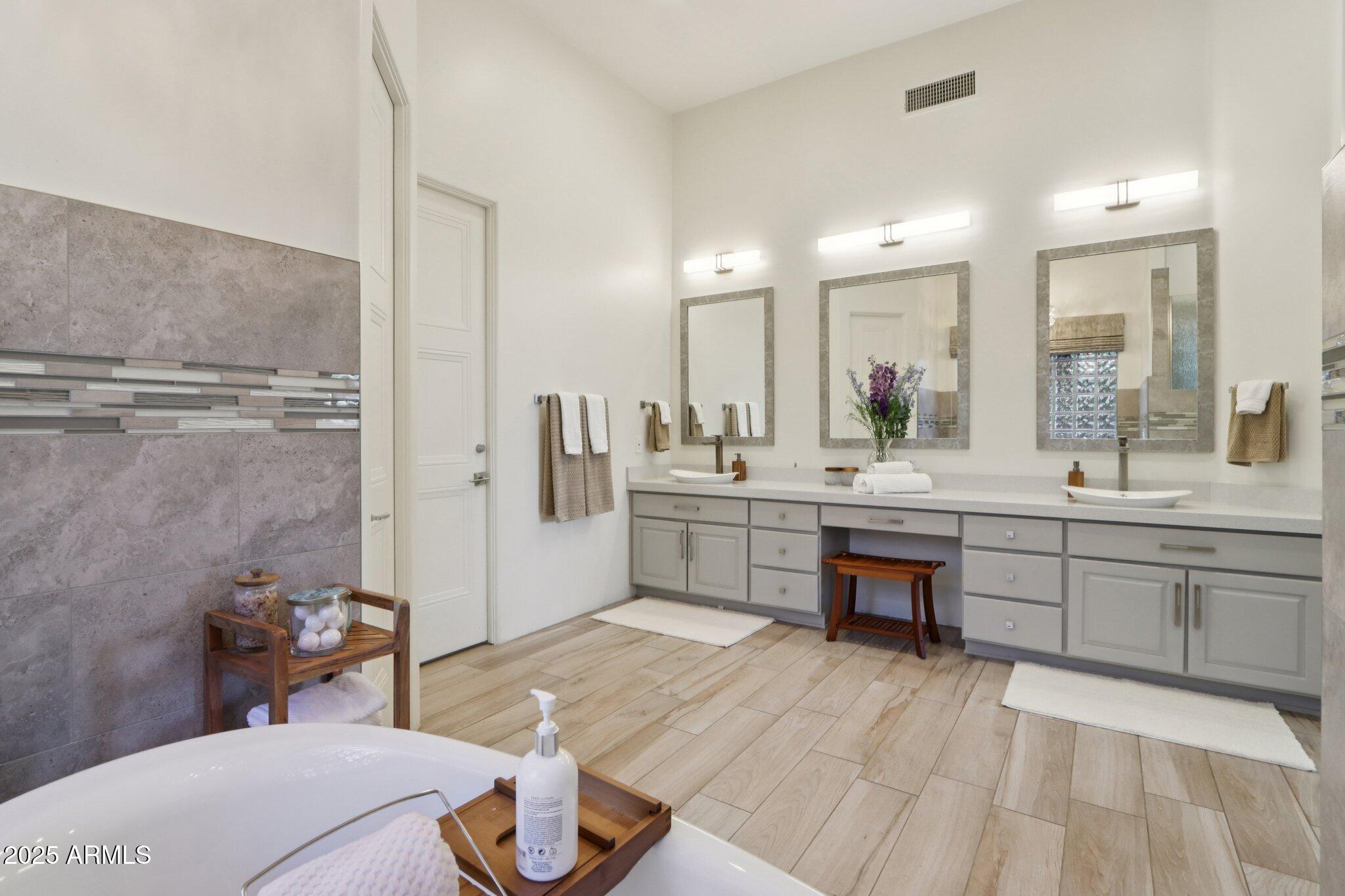 30600 North Pima Road, Unit 49 Scottsdale, AZ 85266 - Photo 20 of 53 a bathroom with a sink a toilet a mirror and shower