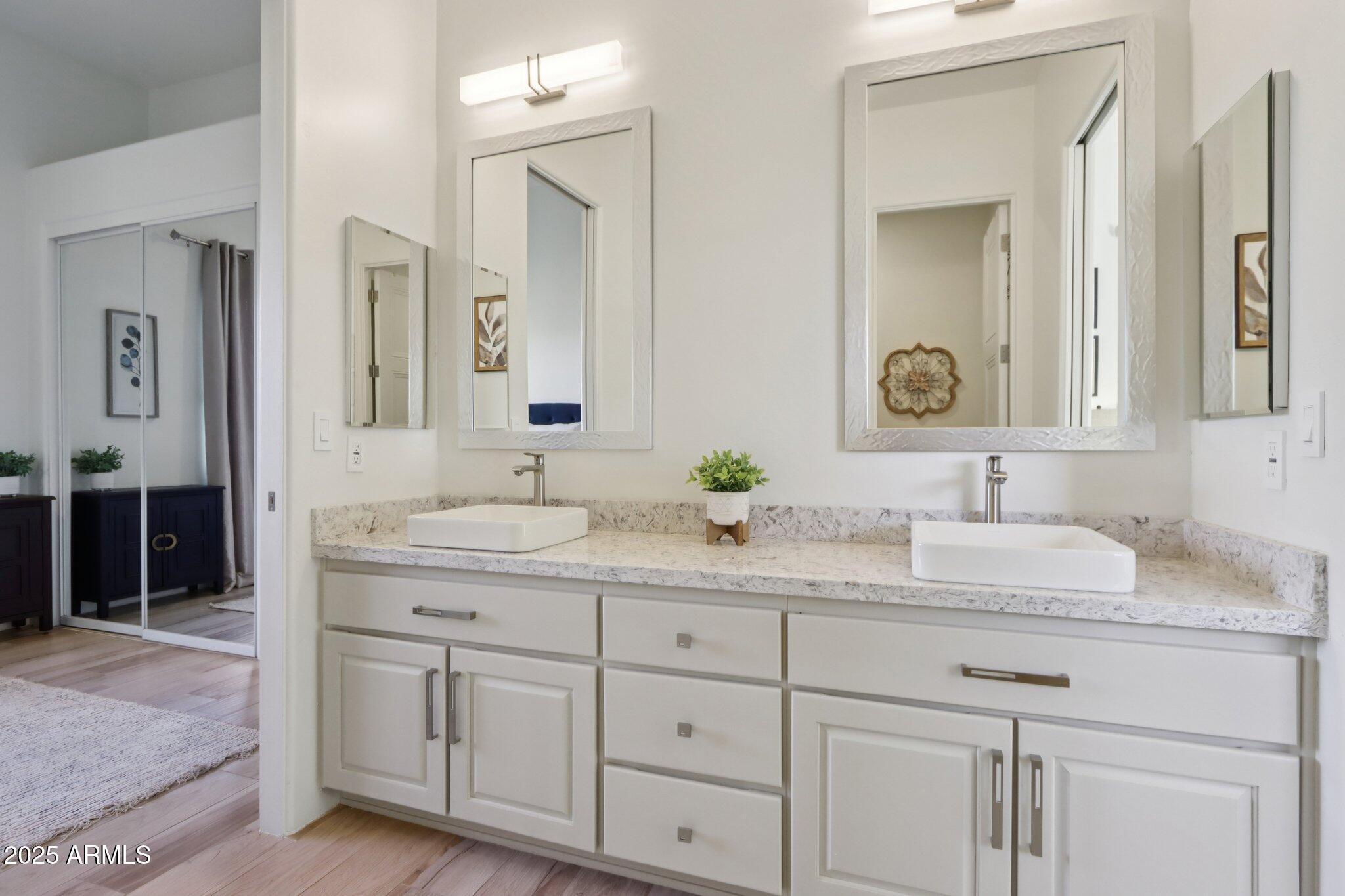 30600 North Pima Road, Unit 49 Scottsdale, AZ 85266 - Photo 31 of 53 a bathroom with double sink and a mirror