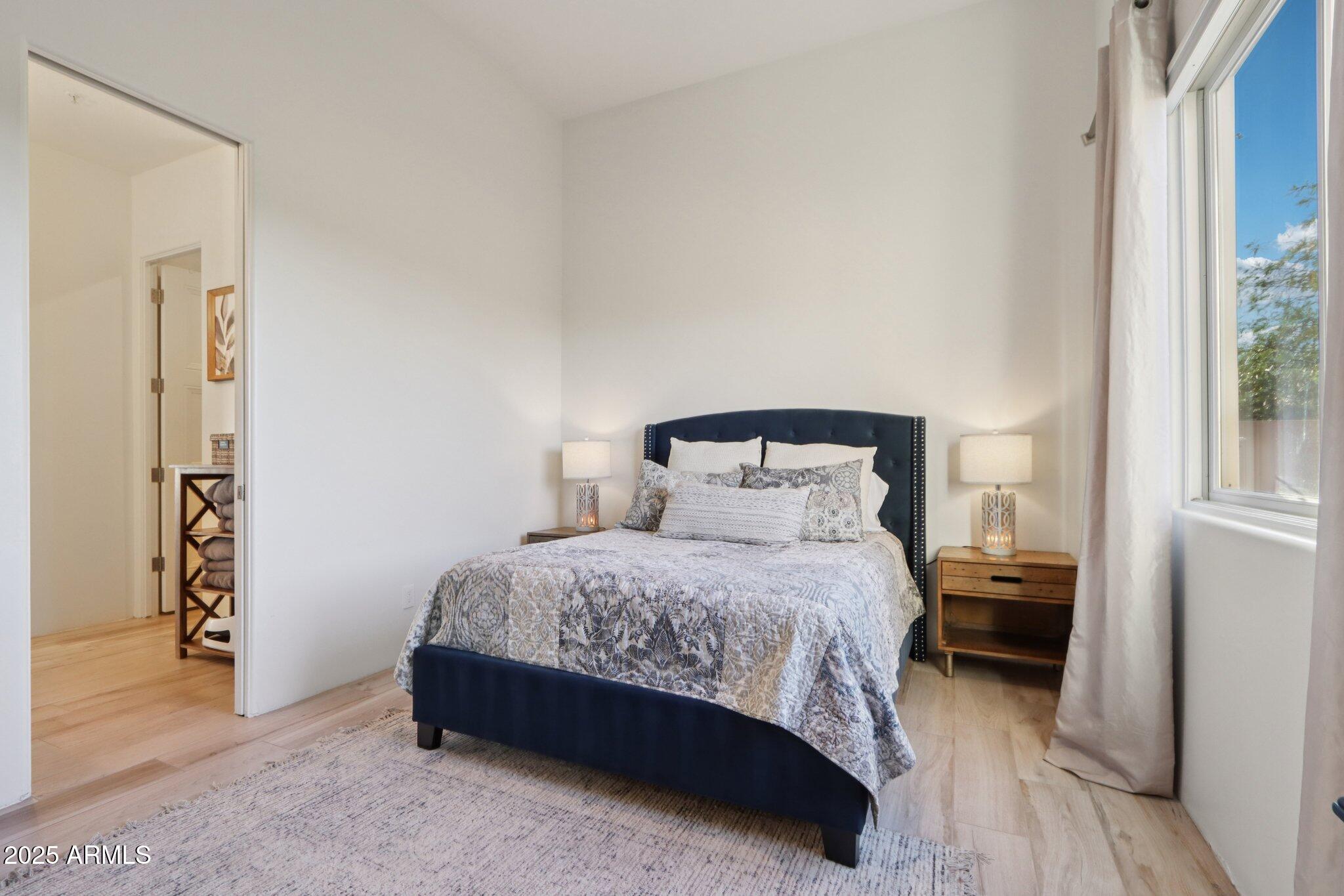 30600 North Pima Road, Unit 49 Scottsdale, AZ 85266 - Photo 32 of 53 a bedroom with a bed and a window