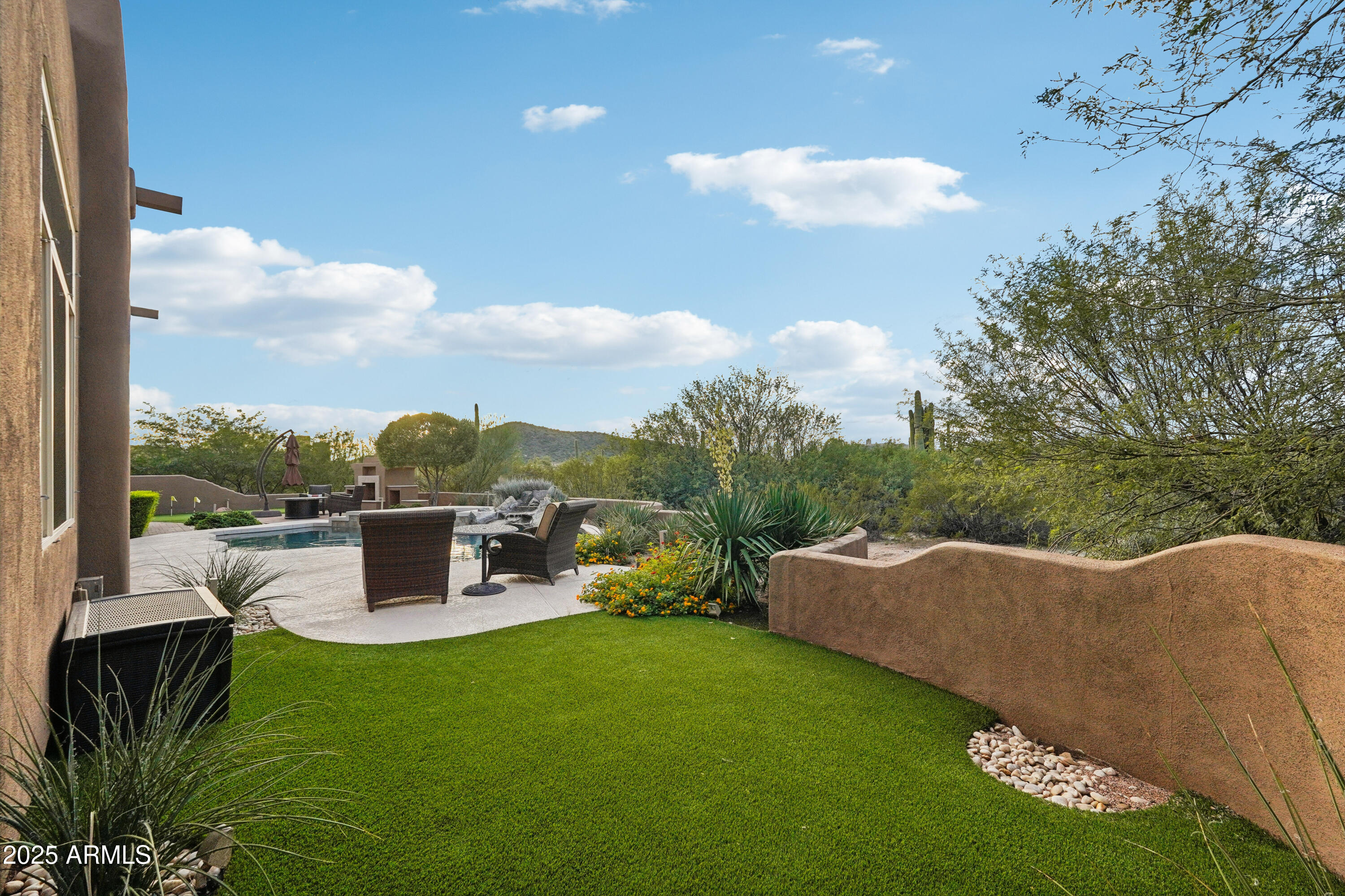 30600 North Pima Road, Unit 49 Scottsdale, AZ 85266 - Photo 38 of 53 a terrace of a house with outdoor seating