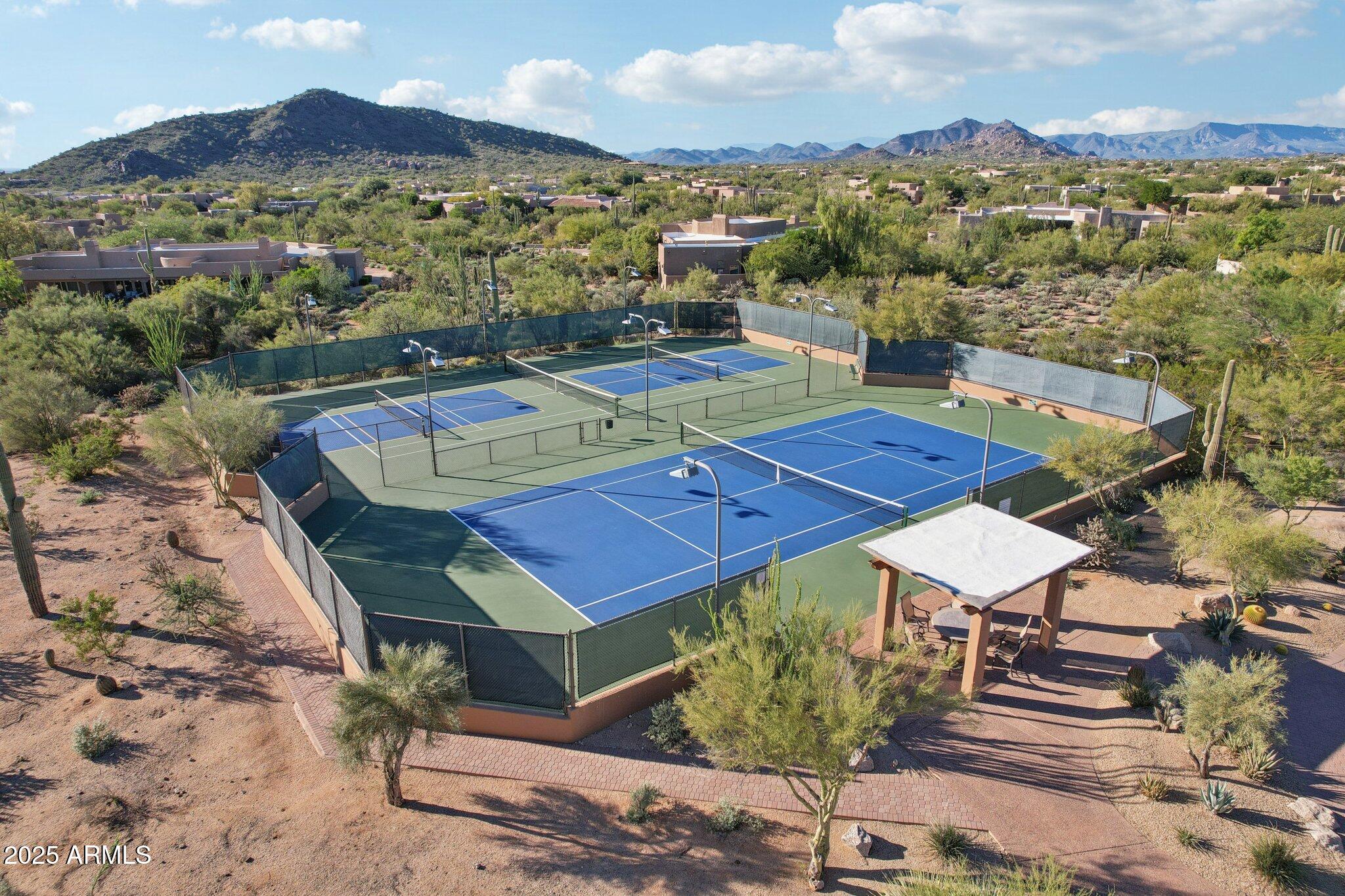 30600 North Pima Road, Unit 49 Scottsdale, AZ 85266 - Photo 49 of 53 an aerial view of a house with a mountain