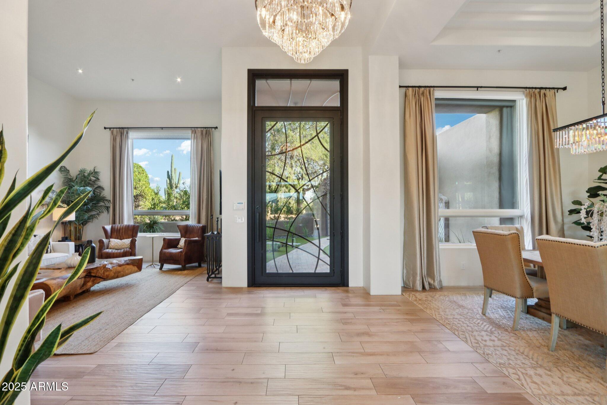 30600 North Pima Road, Unit 49 Scottsdale, AZ 85266 - Photo 9 of 53 a view of a livingroom with furniture and a potted plant