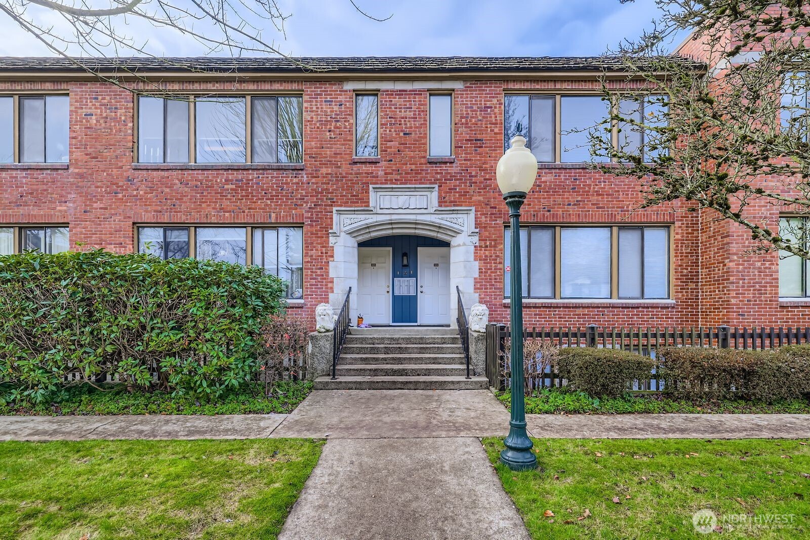 front view of a house with a yard