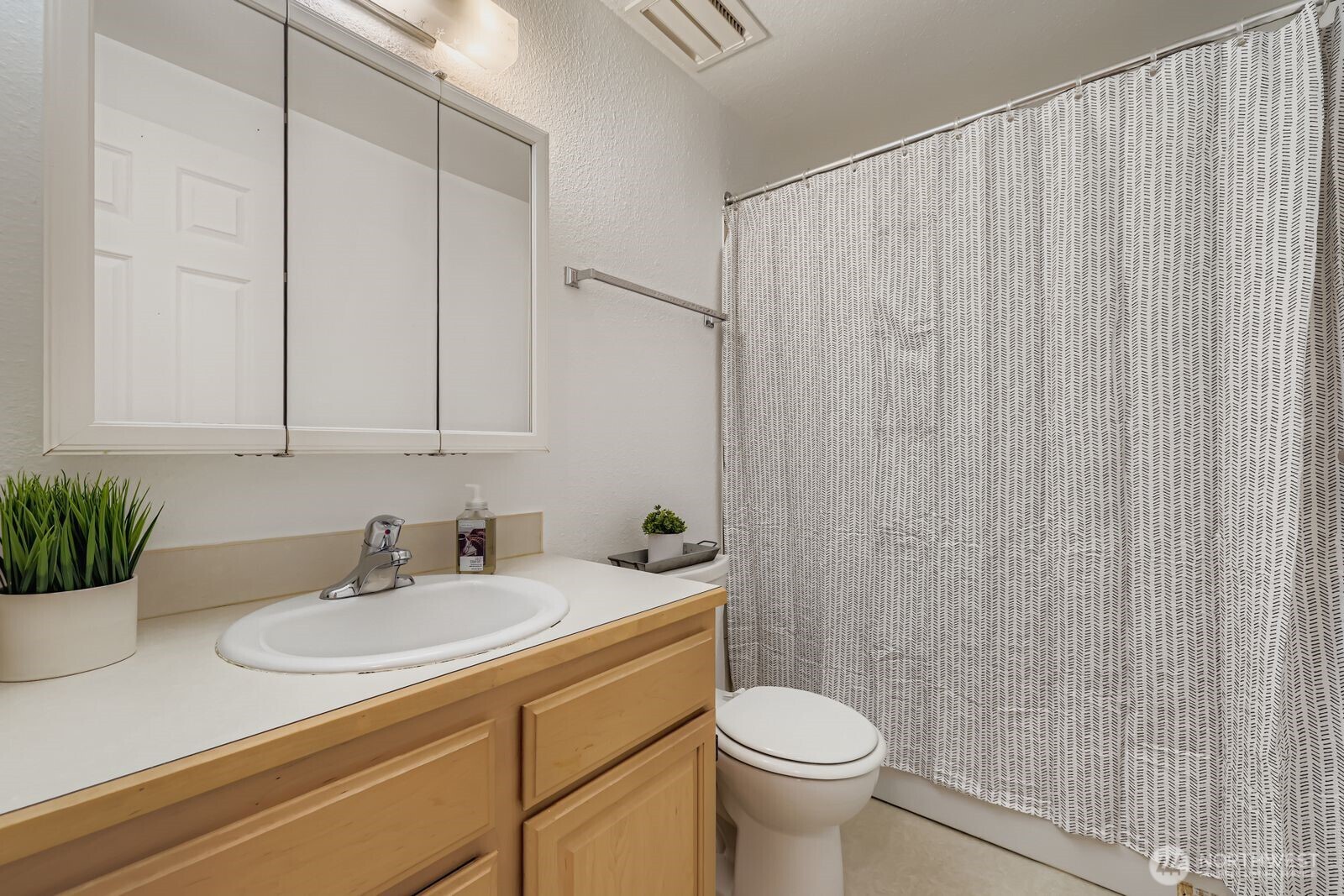 2120 Highland Avenue, Unit 104 Everett, WA 98201 - Photo 14 of 22 a bathroom with a sink toilet and shower