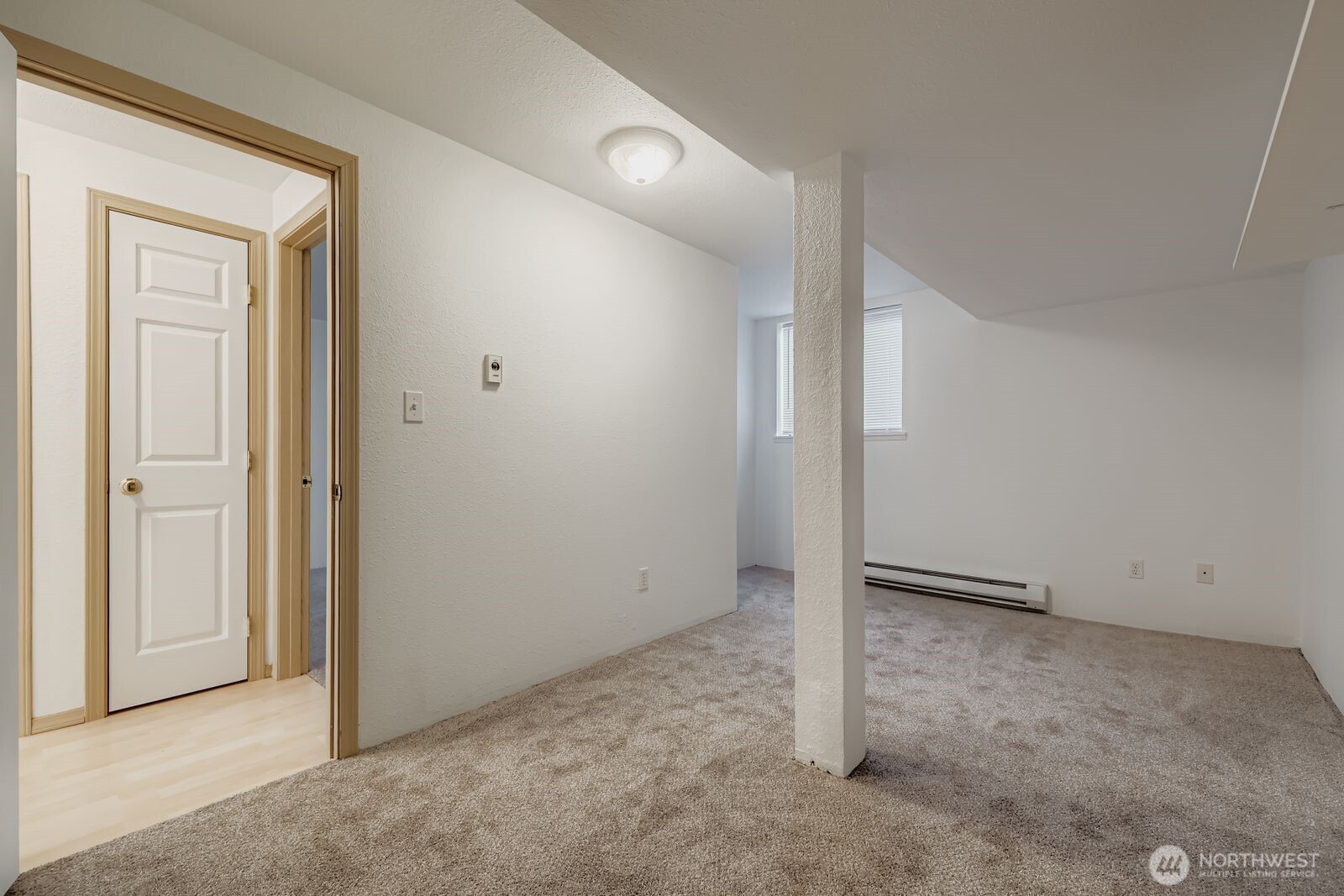 2120 Highland Avenue, Unit 104 Everett, WA 98201 - Photo 17 of 22 an empty room with a door