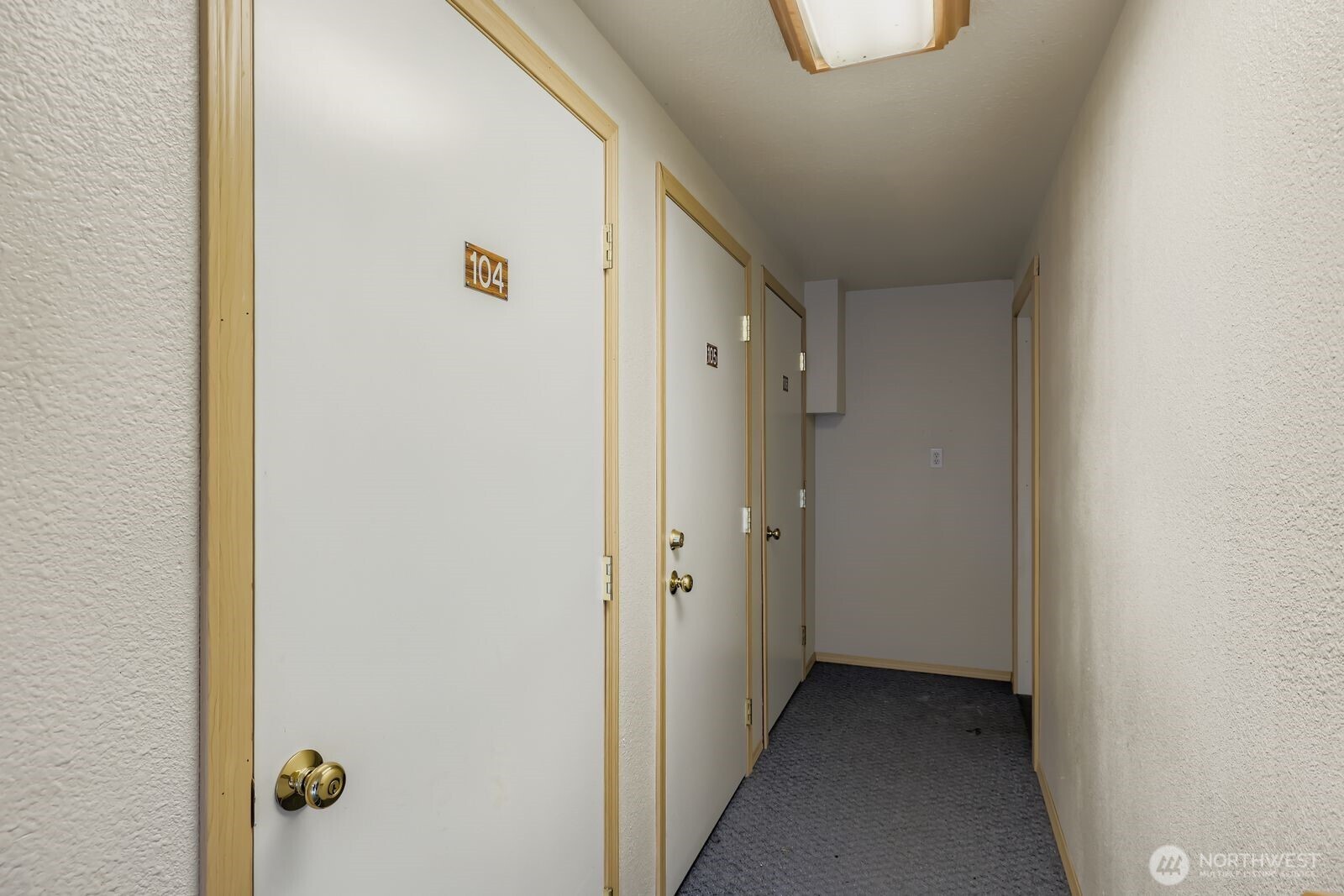 2120 Highland Avenue, Unit 104 Everett, WA 98201 - Photo 21 of 22 a view of a hallway