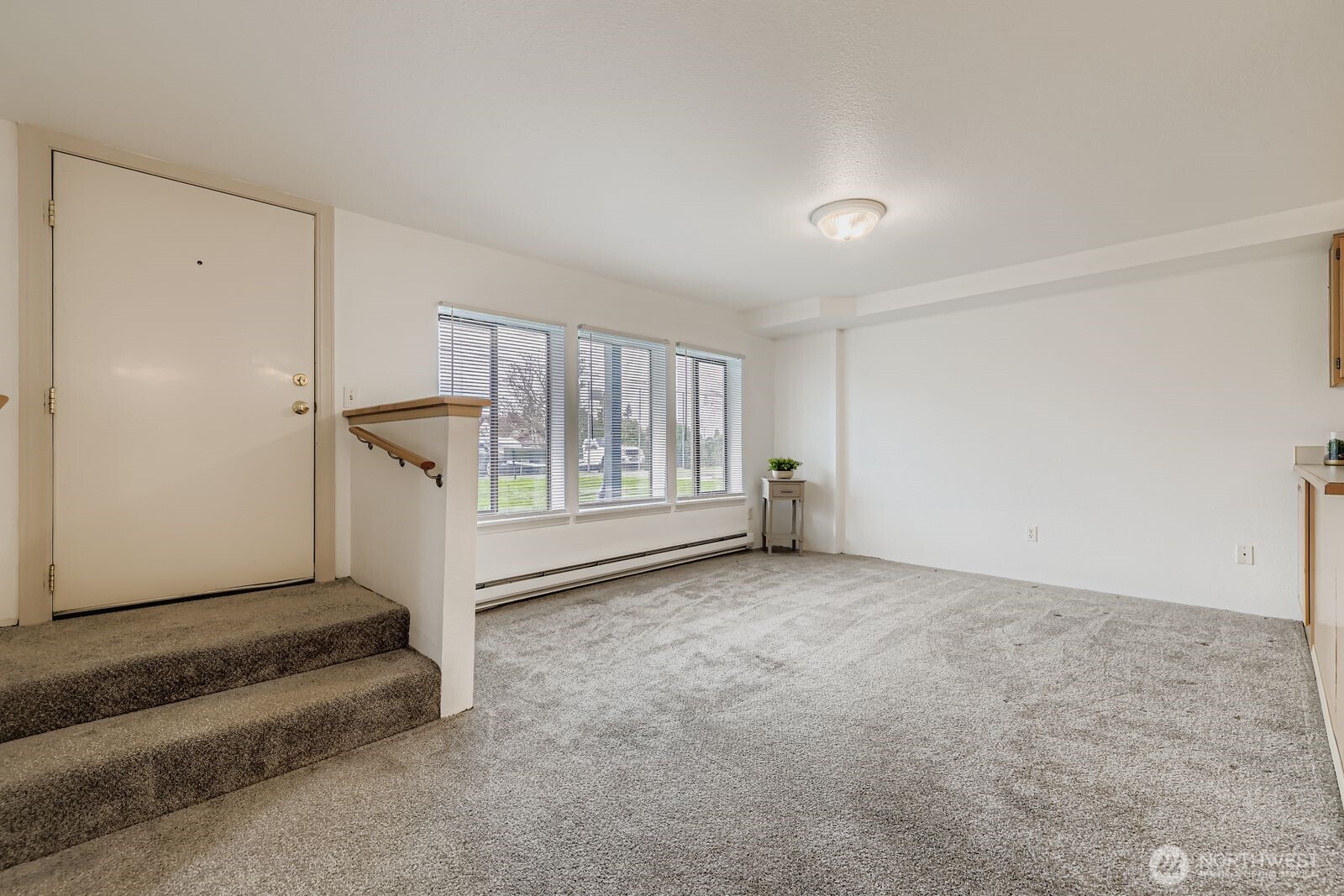 2120 Highland Avenue, Unit 104 Everett, WA 98201 - Photo 3 of 22 a view of an empty room with a window