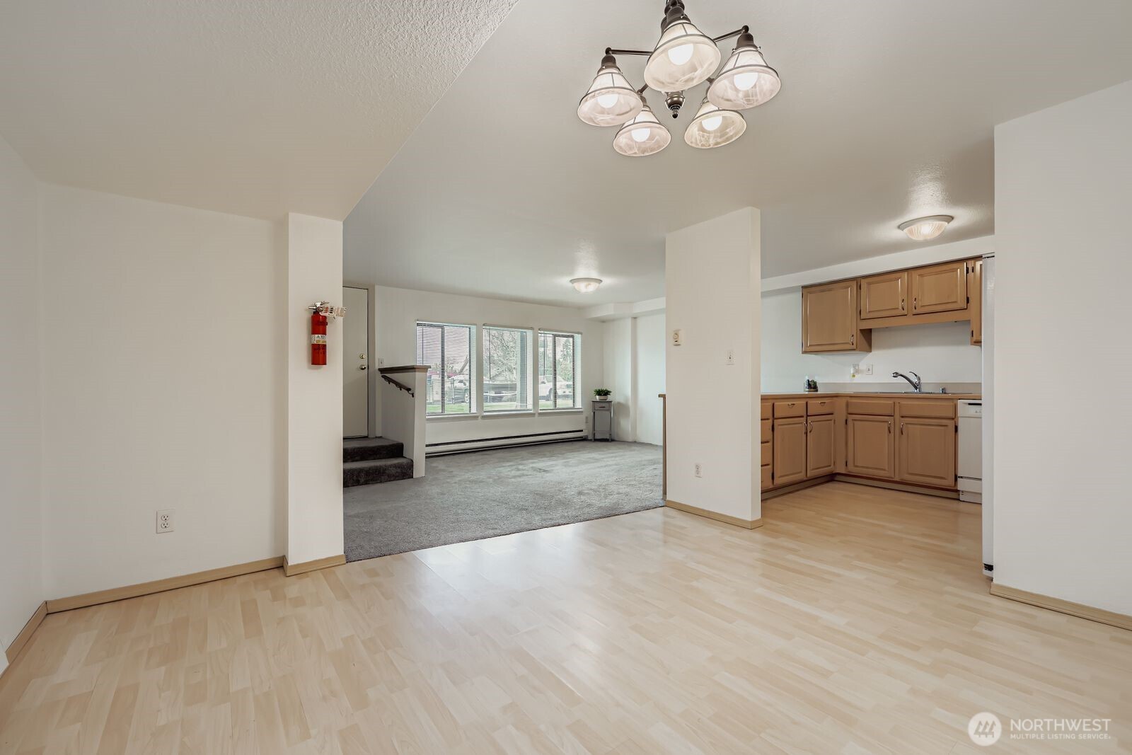 2120 Highland Avenue, Unit 104 Everett, WA 98201 - Photo 6 of 22 a view of a kitchen with a sink dishwasher and a refrigerator