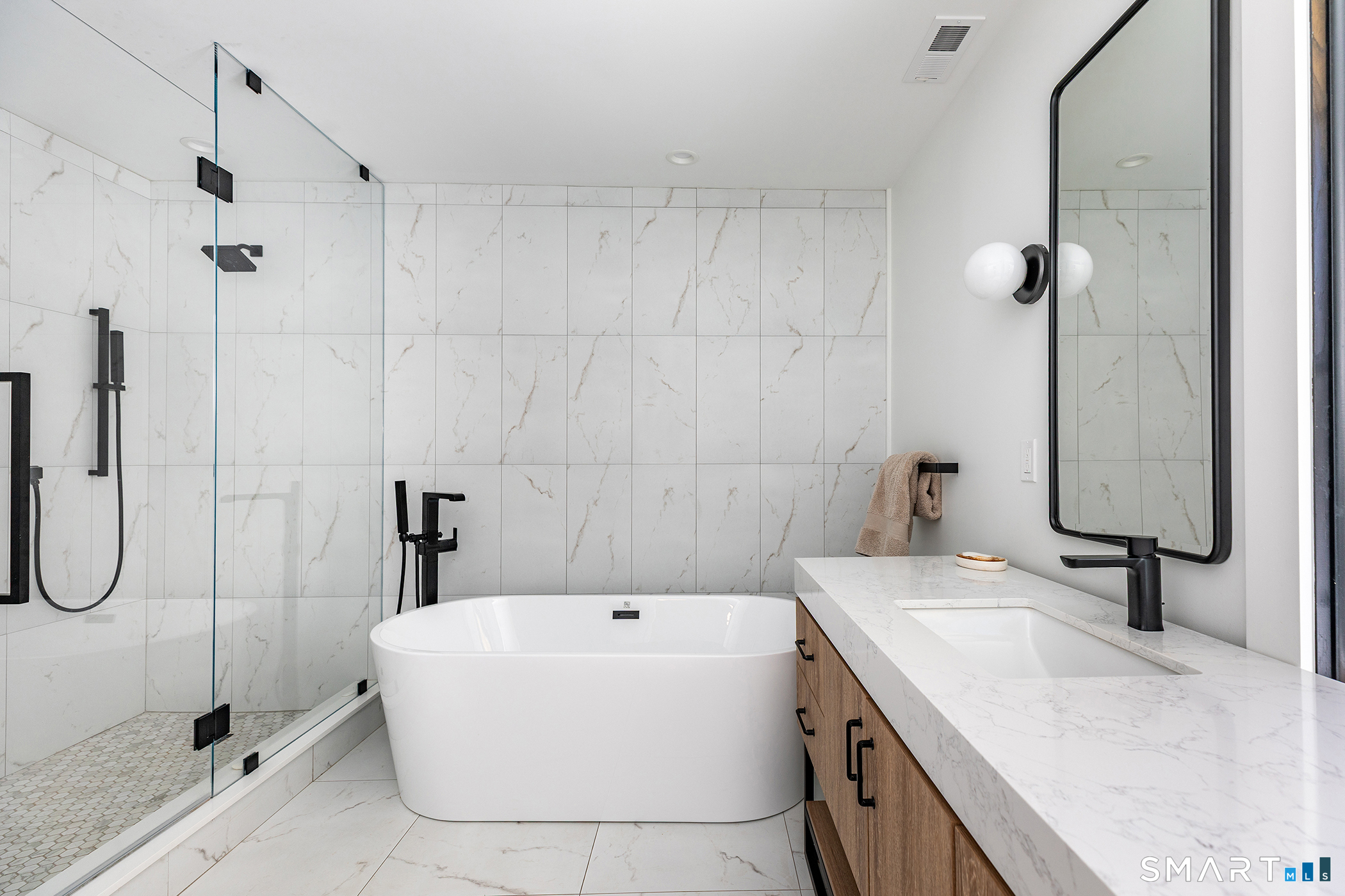 45 Chalybes Road Roxbury, CT 06783 - Photo 13 of 33 a bathroom with a granite countertop sink a toilet and shower