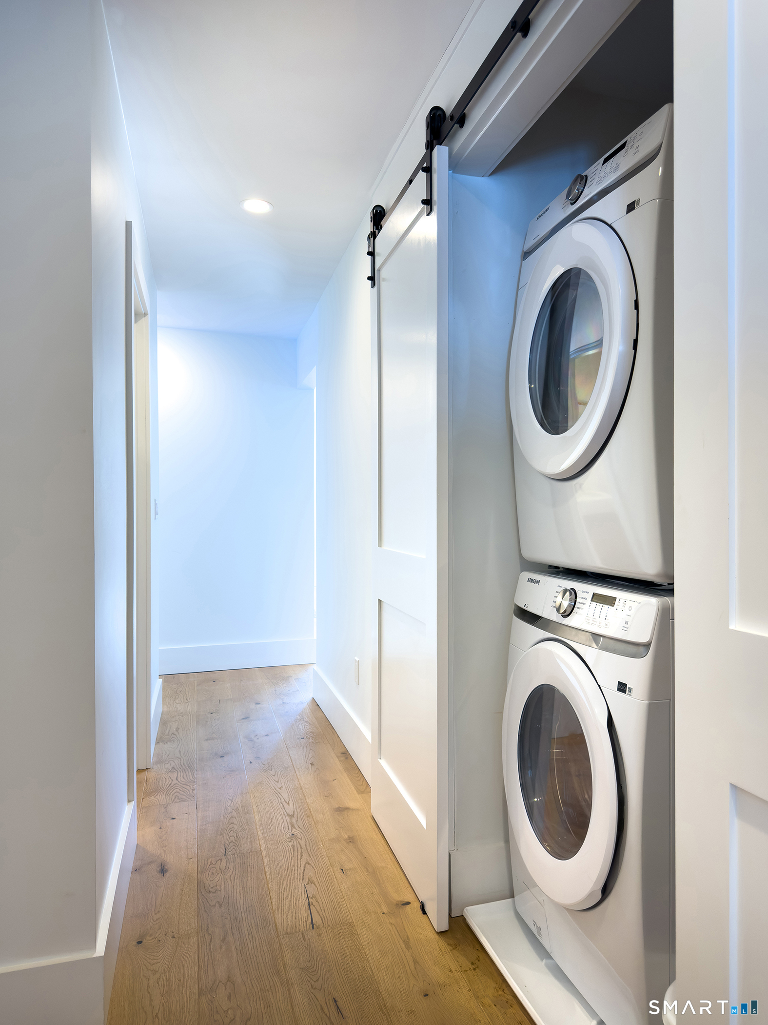 45 Chalybes Road Roxbury, CT 06783 - Photo 16 of 33 a view of a hallway with washer and dryer
