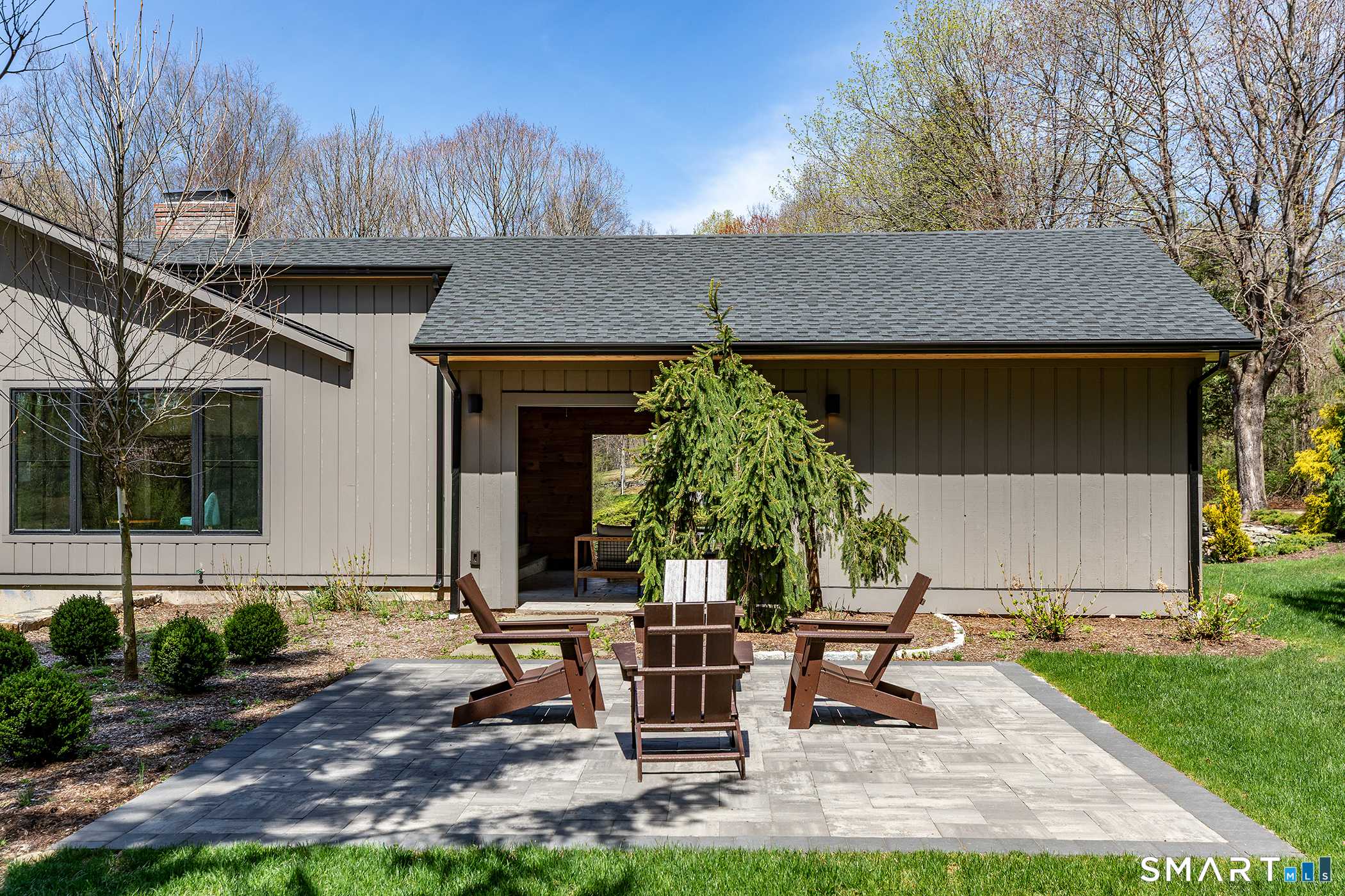 45 Chalybes Road Roxbury, CT 06783 - Photo 28 of 33 a view of a house with backyard and sitting area