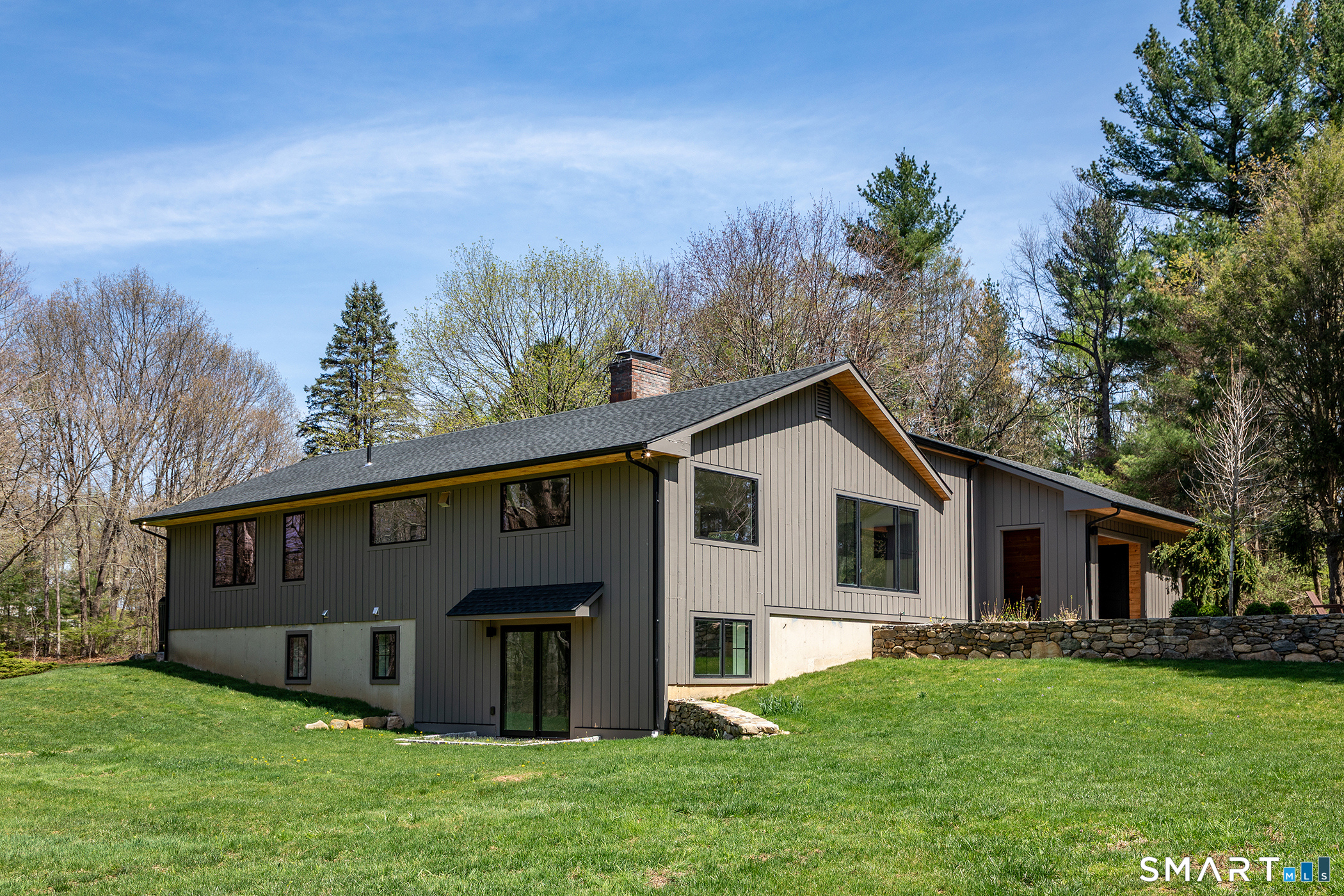 45 Chalybes Road Roxbury, CT 06783 - Photo 31 of 33 a front view of a house with garden