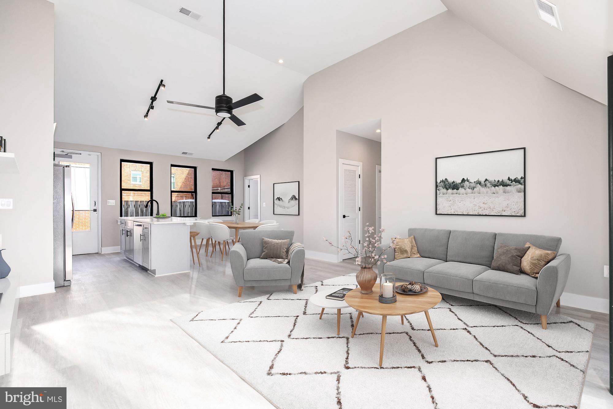 3325 M Street Northwest, Unit TWO Washington, DC 20007 - Photo 2 of 33 a living room with furniture and white walls
