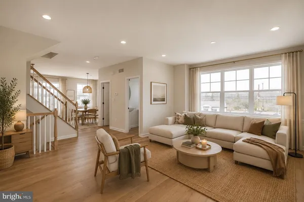 a living room with furniture or couch and a window