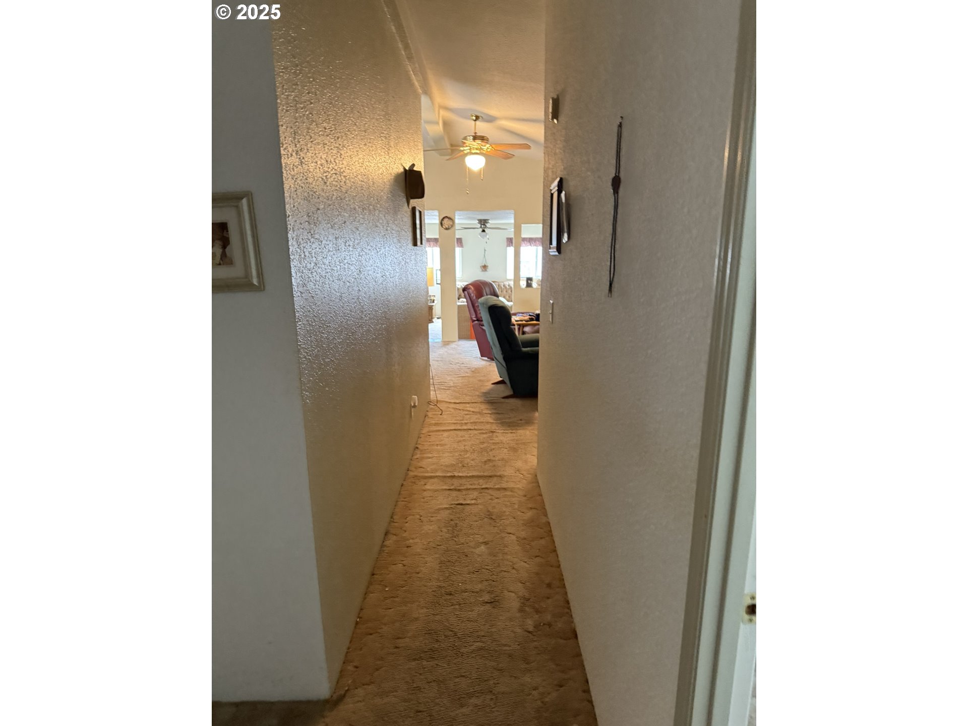 100 River Bend Road, Unit 74 Reedsport, OR 97467 - Photo 12 of 22 a view of a hallway with a white walls