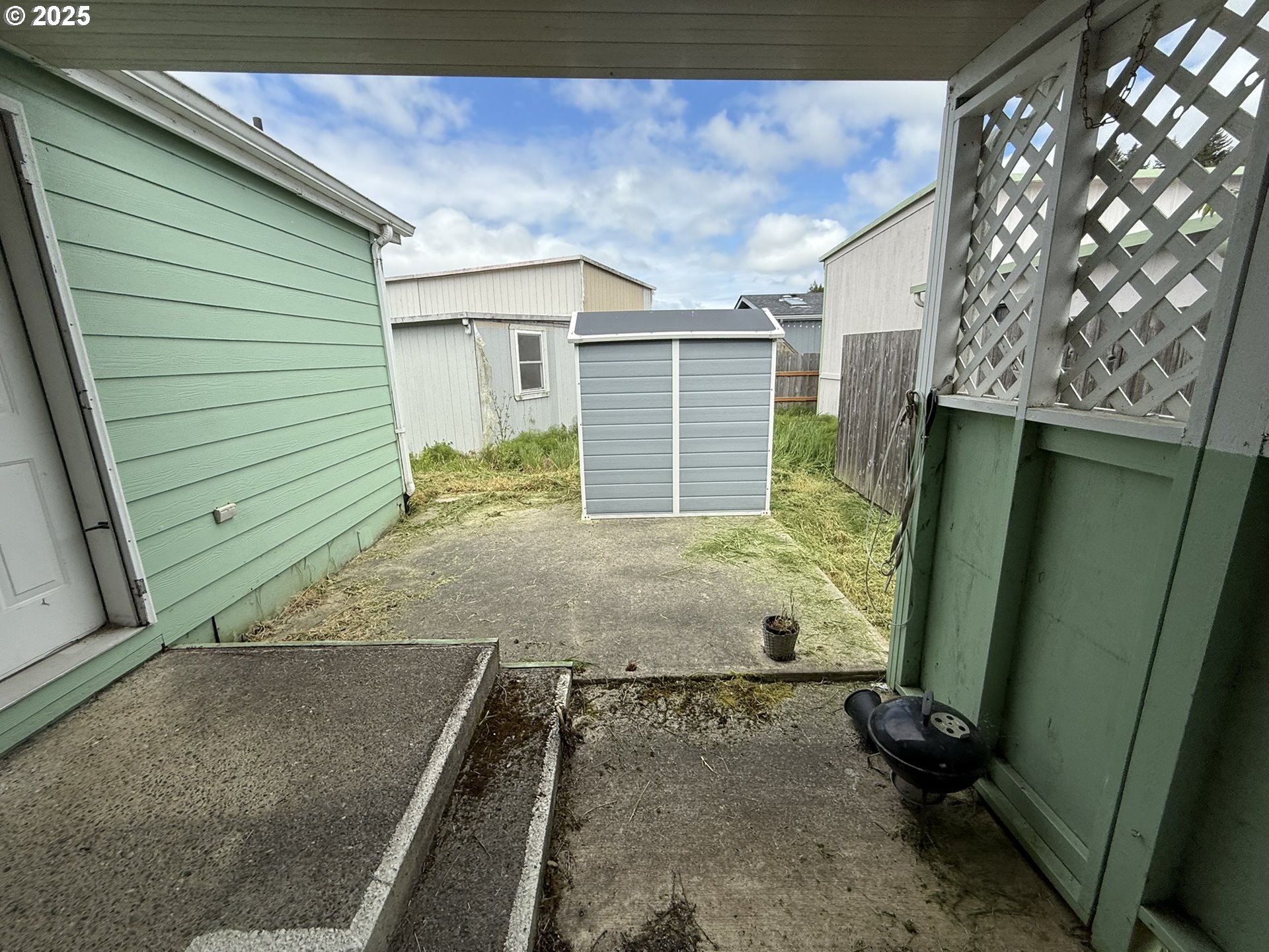 100 River Bend Road, Unit 74 Reedsport, OR 97467 - Photo 20 of 22 a view of house with backyard