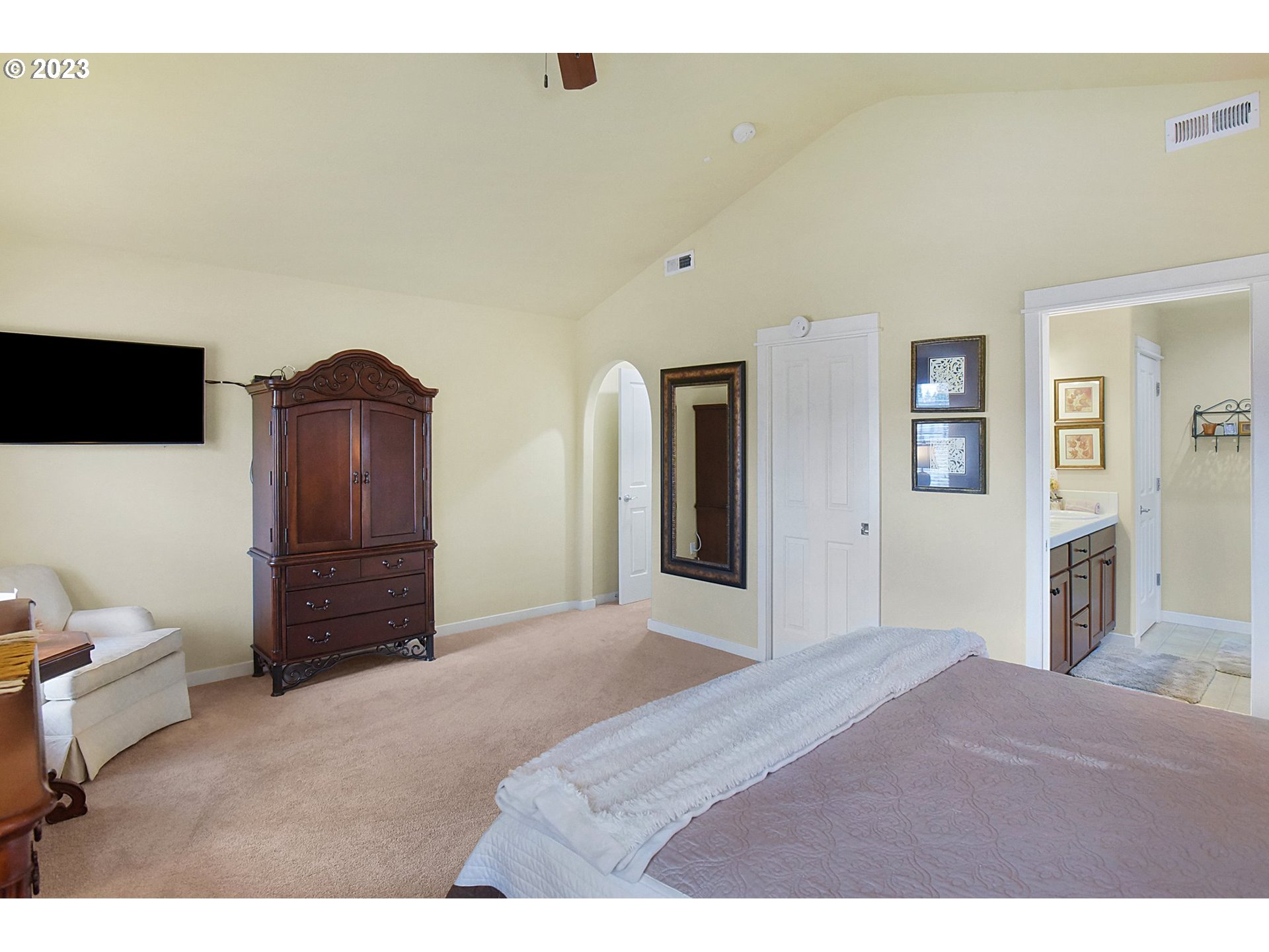 7826 Southwest Alder Street Tigard, OR 97224 - Photo 18 of 30 a bedroom with a bed and furniture