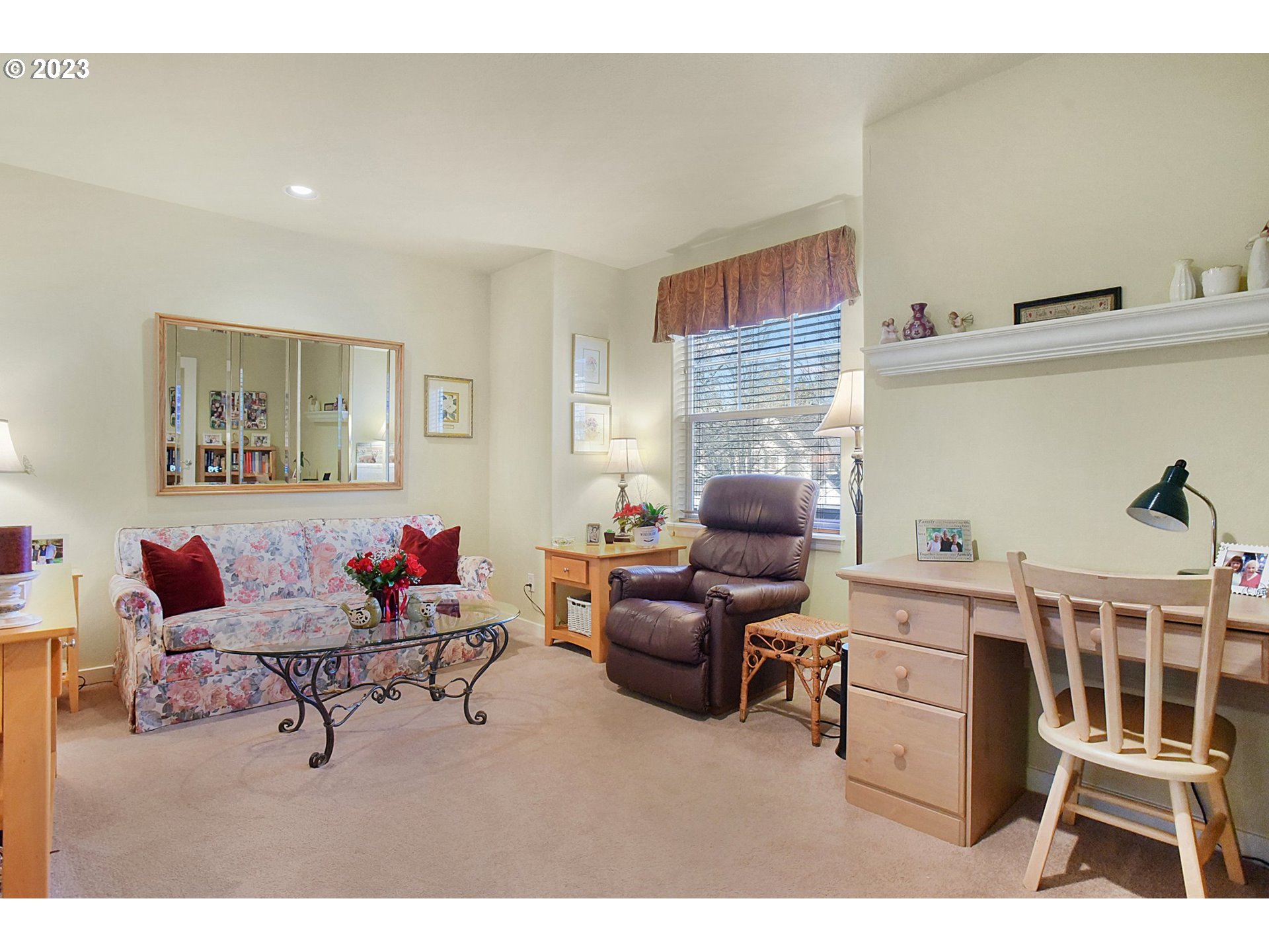 7826 Southwest Alder Street Tigard, OR 97224 - Photo 22 of 30 a living room with furniture and a wooden floor