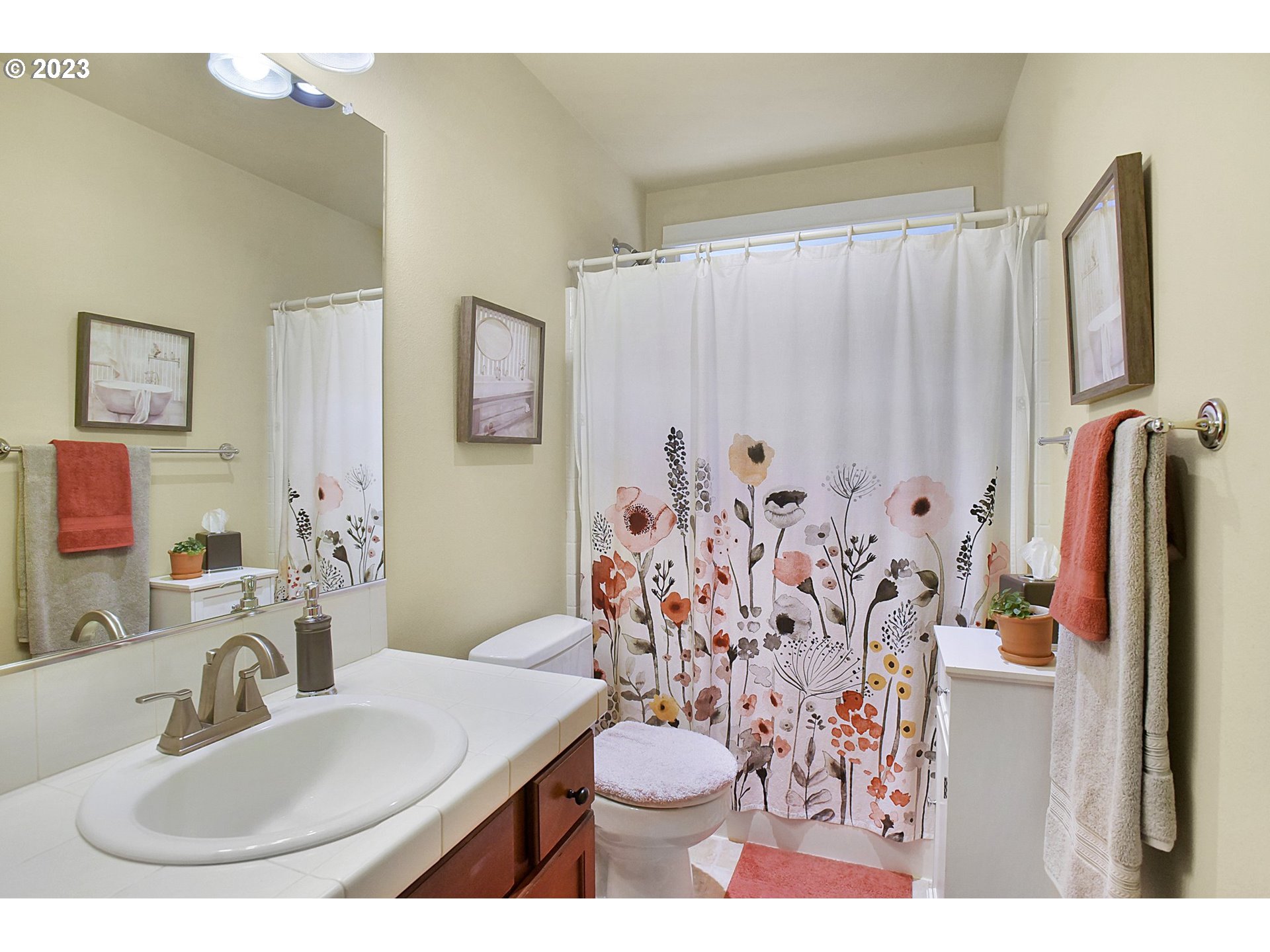 7826 Southwest Alder Street Tigard, OR 97224 - Photo 25 of 30 a bathroom with a sink toilet and shower