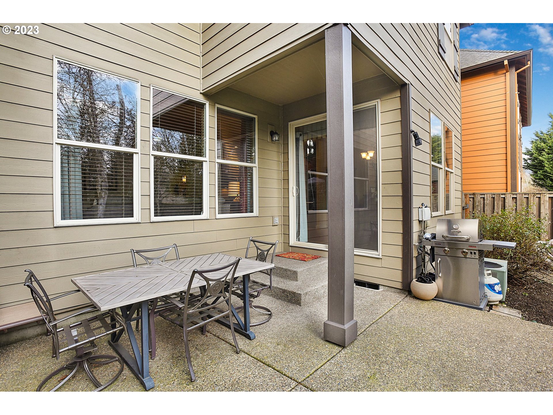 7826 Southwest Alder Street Tigard, OR 97224 - Photo 27 of 30 a house view with outdoor seating space