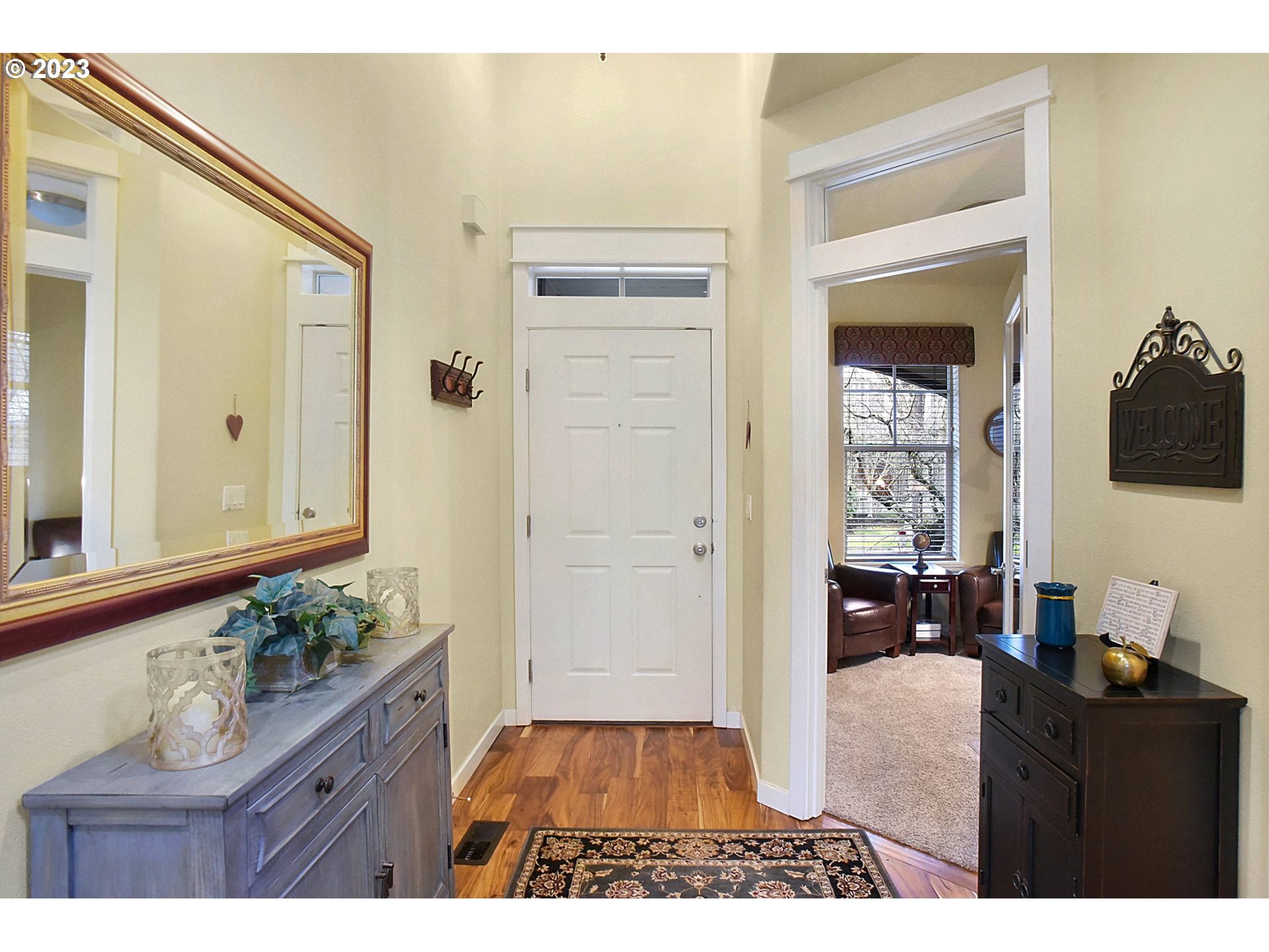7826 Southwest Alder Street Tigard, OR 97224 - Photo 3 of 30 a living room with furniture and a flat screen tv