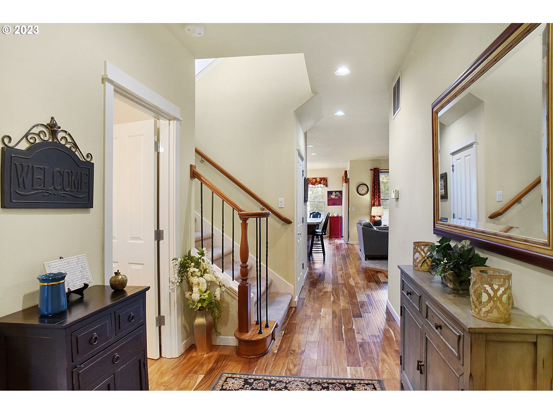 7826 Southwest Alder Street Tigard, OR 97224 - Photo 4 of 30 a living room with furniture and a wooden floor