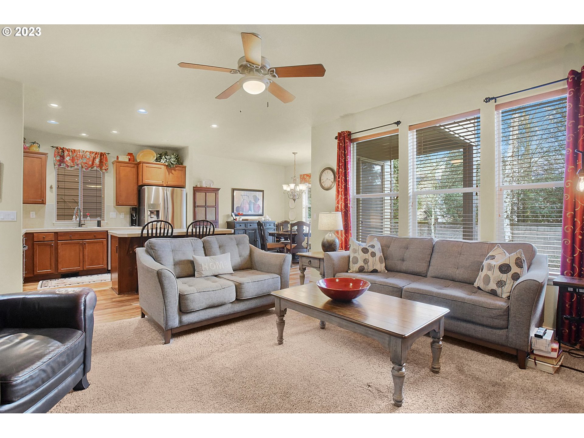 7826 Southwest Alder Street Tigard, OR 97224 - Photo 9 of 30 a living room with furniture and a large window
