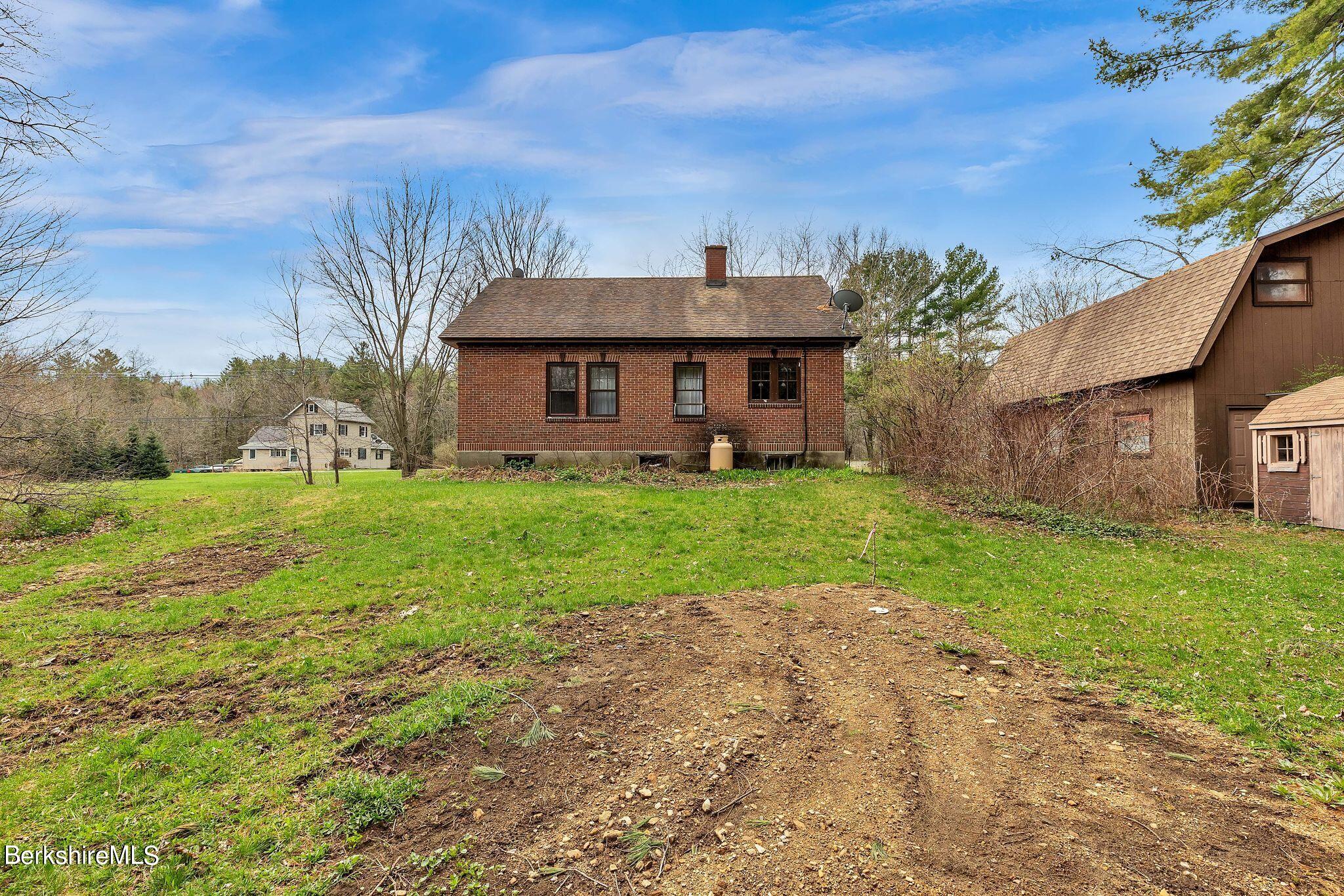 365 South Washington State Road Washington, MA 01223 - Photo 34 of 43 a view of a house with a yard and potted plants