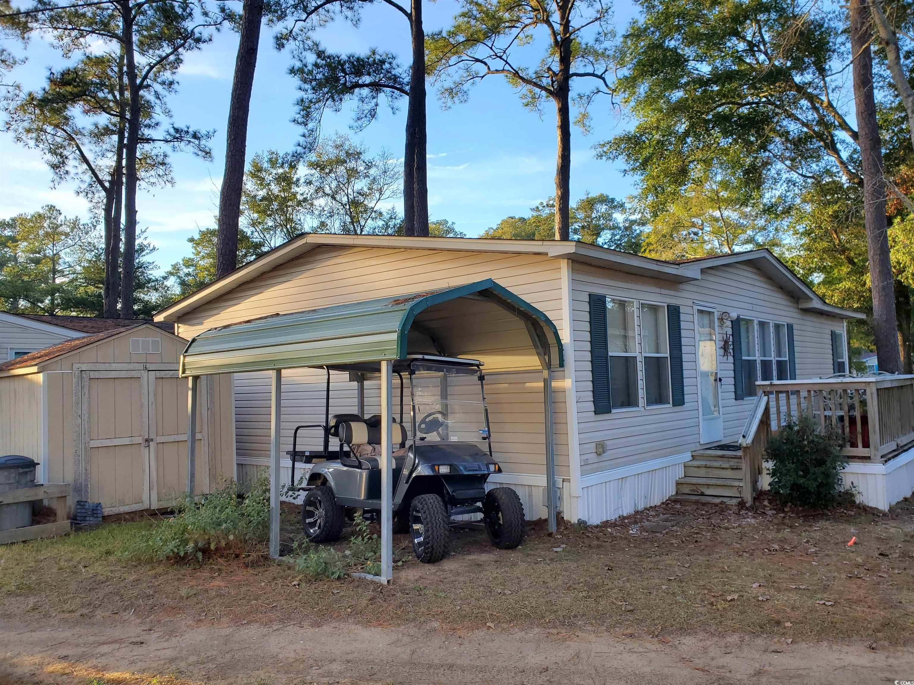 441 Delton Drive Murrells Inlet, SC 29576 - Photo 11 of 30 View of front of property featuring a carport and a shed