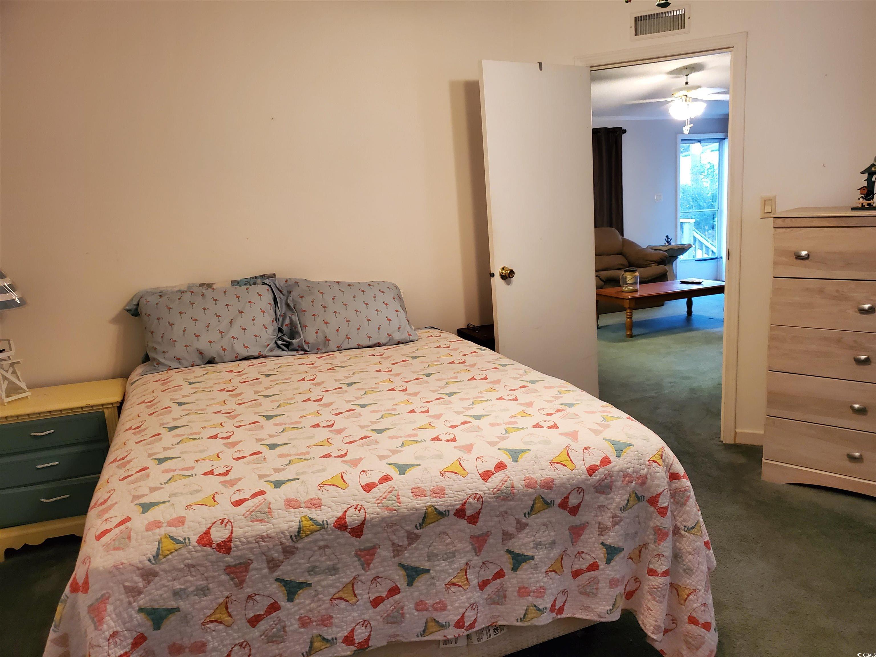 441 Delton Drive Murrells Inlet, SC 29576 - Photo 30 of 30 Bedroom featuring dark carpet