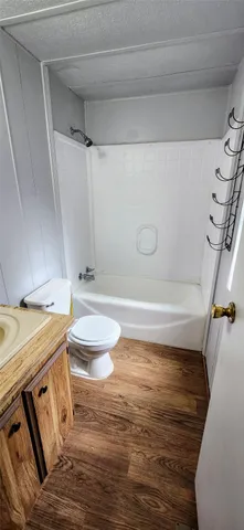 a bathroom with a sink and a toilet